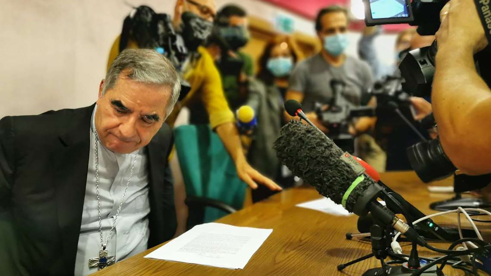 Cardinal Angelo Becciu speaks with journalists during a media conference in Rome Sept. 25. (Catholic News Service/Junno Arocho Esteves)