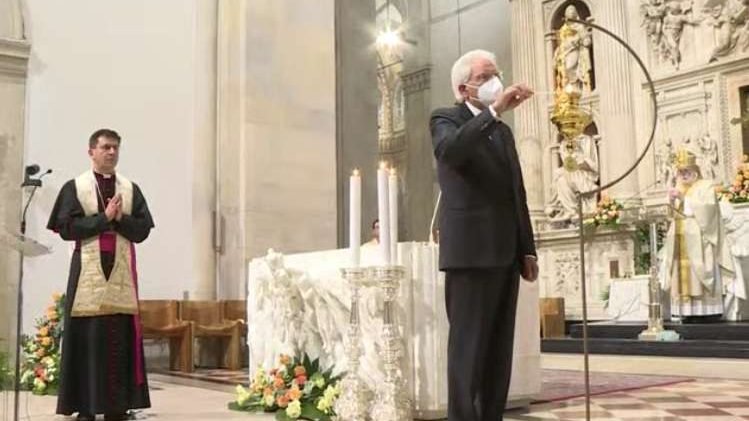 Italian President Sergio Mattarella lights a candle for peace in Loreto Sept. 8, 2020. (Vatican Media/CNA)
