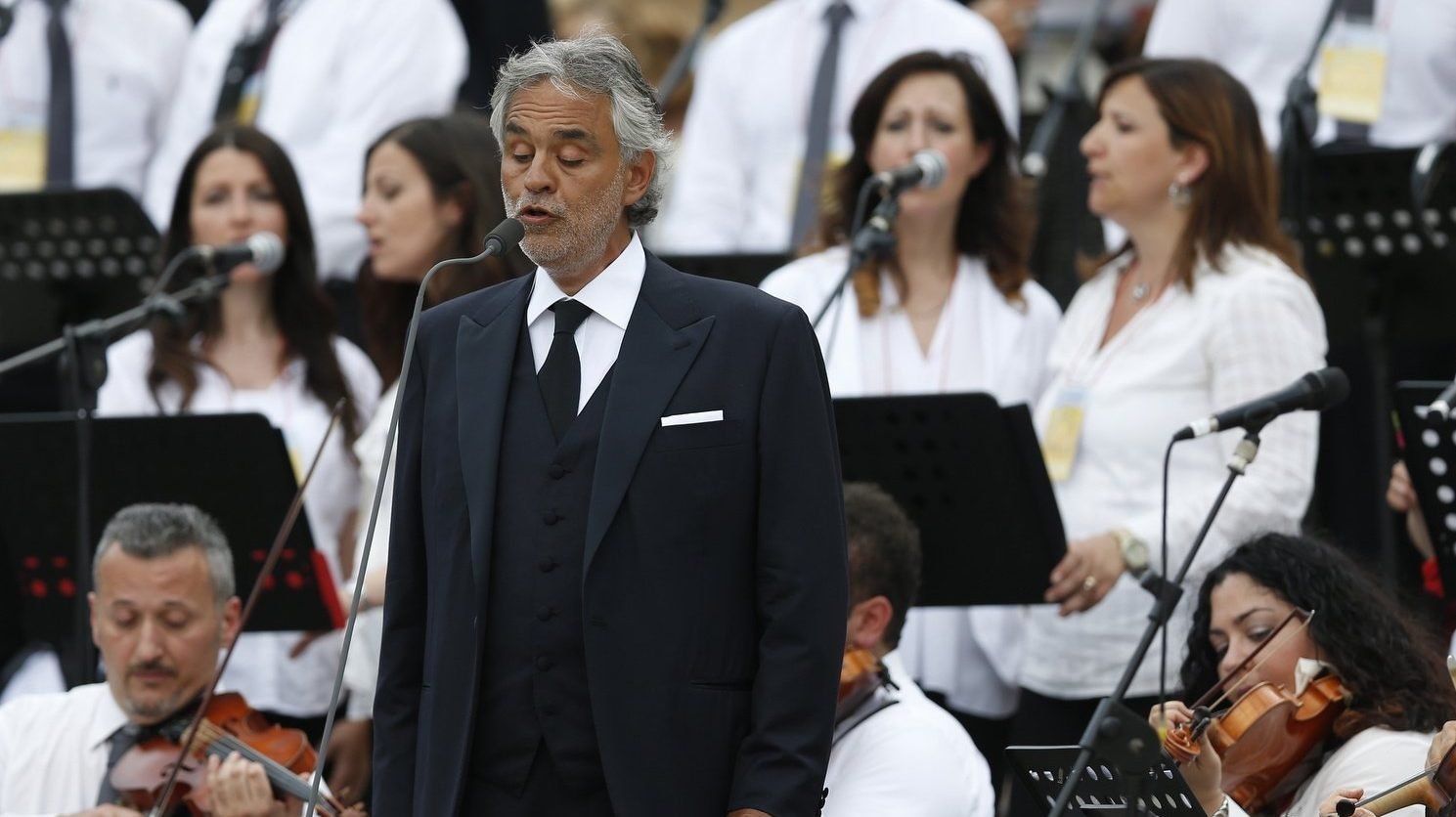 In this 2015 file photo, Italian tenor Andrea Bocelli sings before Pope Francis' meeting with participants in the Renewal of the Spirit meeting in St. Peter's Square at the Vatican. (CNS photo/Paul Haring)