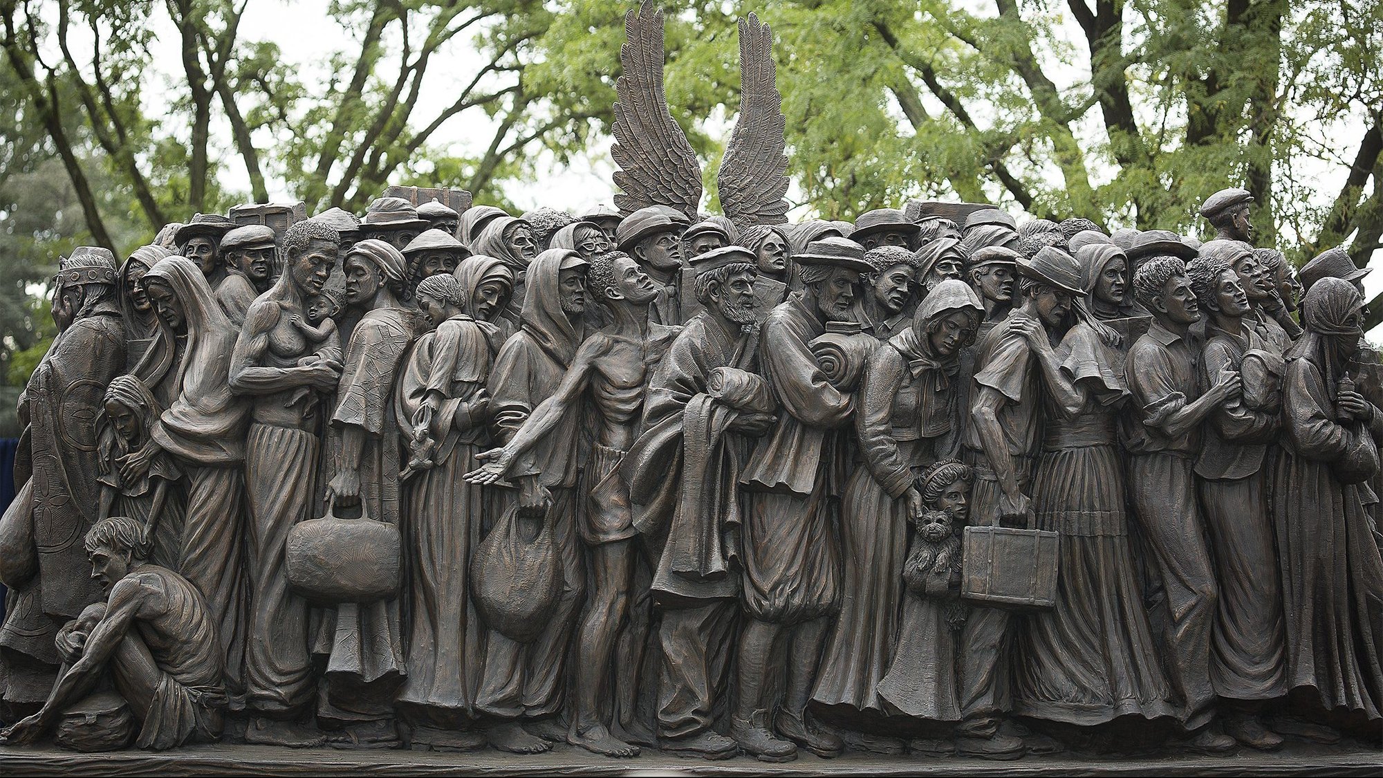 A sculpture called "Angels Unawares" is seen at The Catholic University of America in Washington Sept. 27, 2020. The life-size sculpture, which depicts a group of migrants and refugees crowded on a boat, is a replica of the original one Pope Francis unveiled in St. Peter's Square at the Vatican during the 2019 World Day of Migrants and Refugees. (CNS photo/Tyler Orsburn)