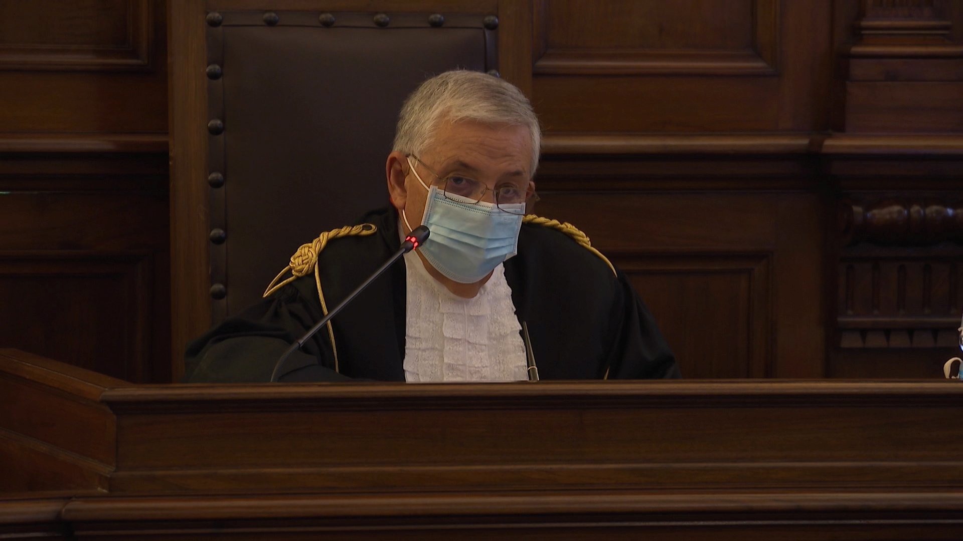 Giuseppe Pignatone, president of the Vatican City State criminal court, speaks during the opening of the trial of two Italian priests accused of sexual abuse at a minor seminary inside the Vatican, in this still image taken from video at the Vatican Oct. 14, 2020. Father Gabriele Martinelli, 28, was accused of repeatedly sexually abusing a younger student at the seminary, and Msgr. Enrico Radice, 71, former rector of the minor seminary, was accused of obstructing the investigation into Father Martinelli. (CNS photo/Vatican Media via Reuters)