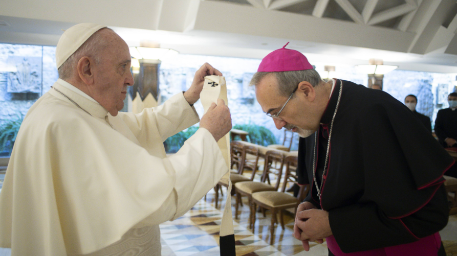 Pope Francis bestows the pallium on newly appointed Latin Patriarch Pierbattista Pizzaballa Oct. 28, 2020. (Vatican Media via CNA)