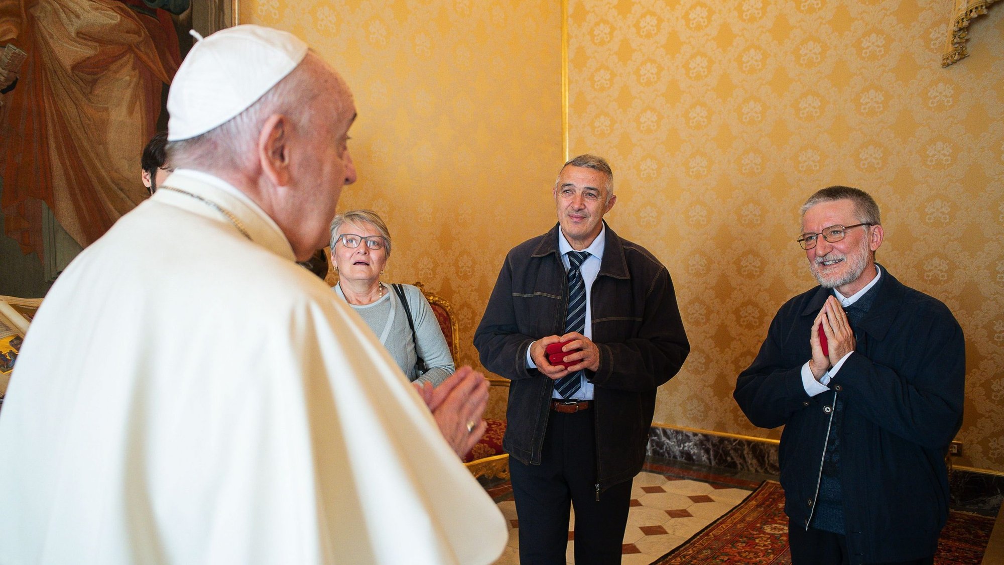 Pope Francis meets Father Pierluigi Maccalli, right, and members of the priest's delegation at the Vatican Nov. 9, 2020. Italian Father Maccalli, a priest of the Society of African Missions, and three other hostages were released Oct. 8 after being kidnapped and held for more than two years in Niger and Mali. (CNS photo/Vatican Media)
