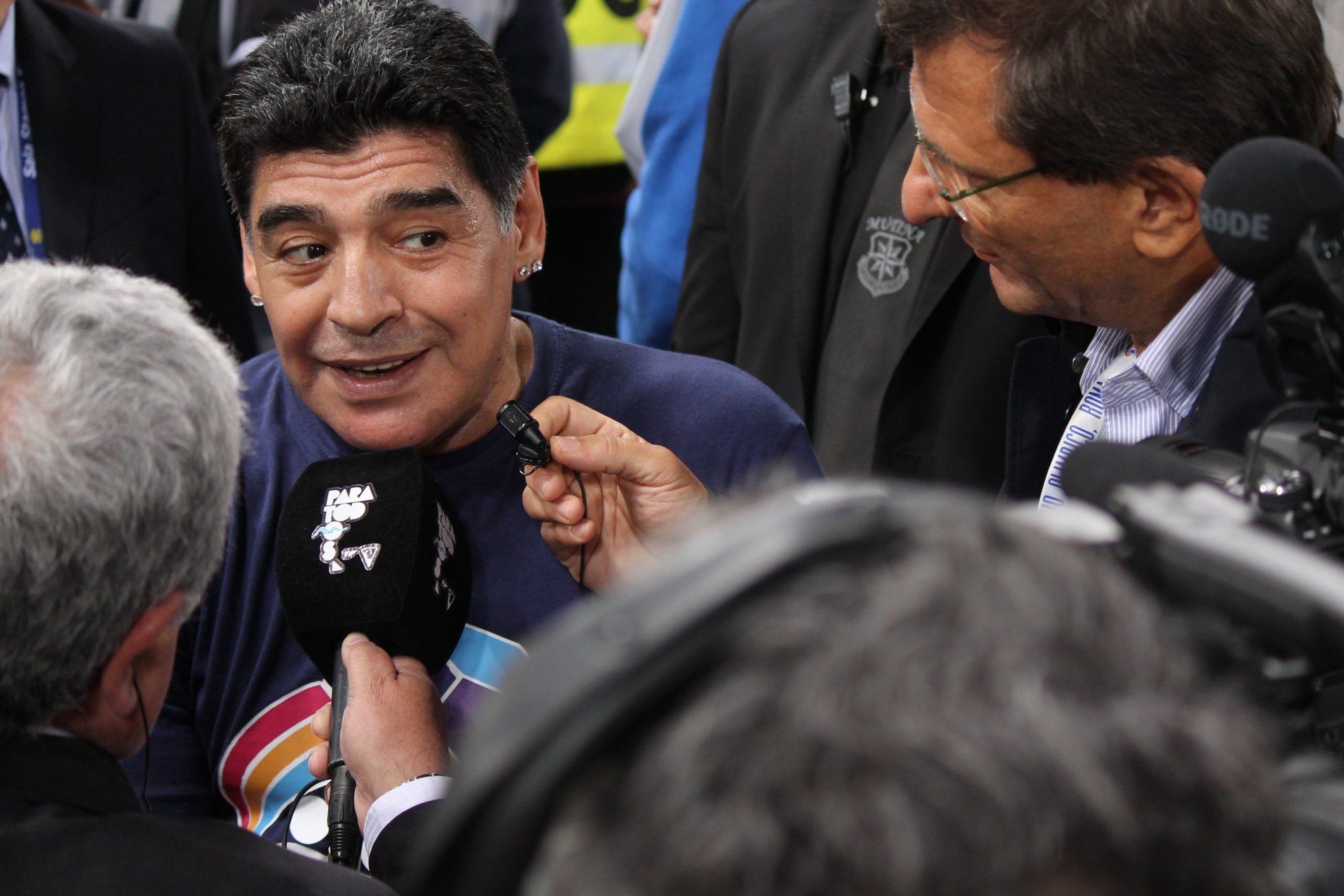 Diego Maradona speaks to the press on the field during the 2014 Match for Peace in Rome's Olympic Stadium on Sept. 1, 2014. (Catholic News Agency/Daniel Ibañez)