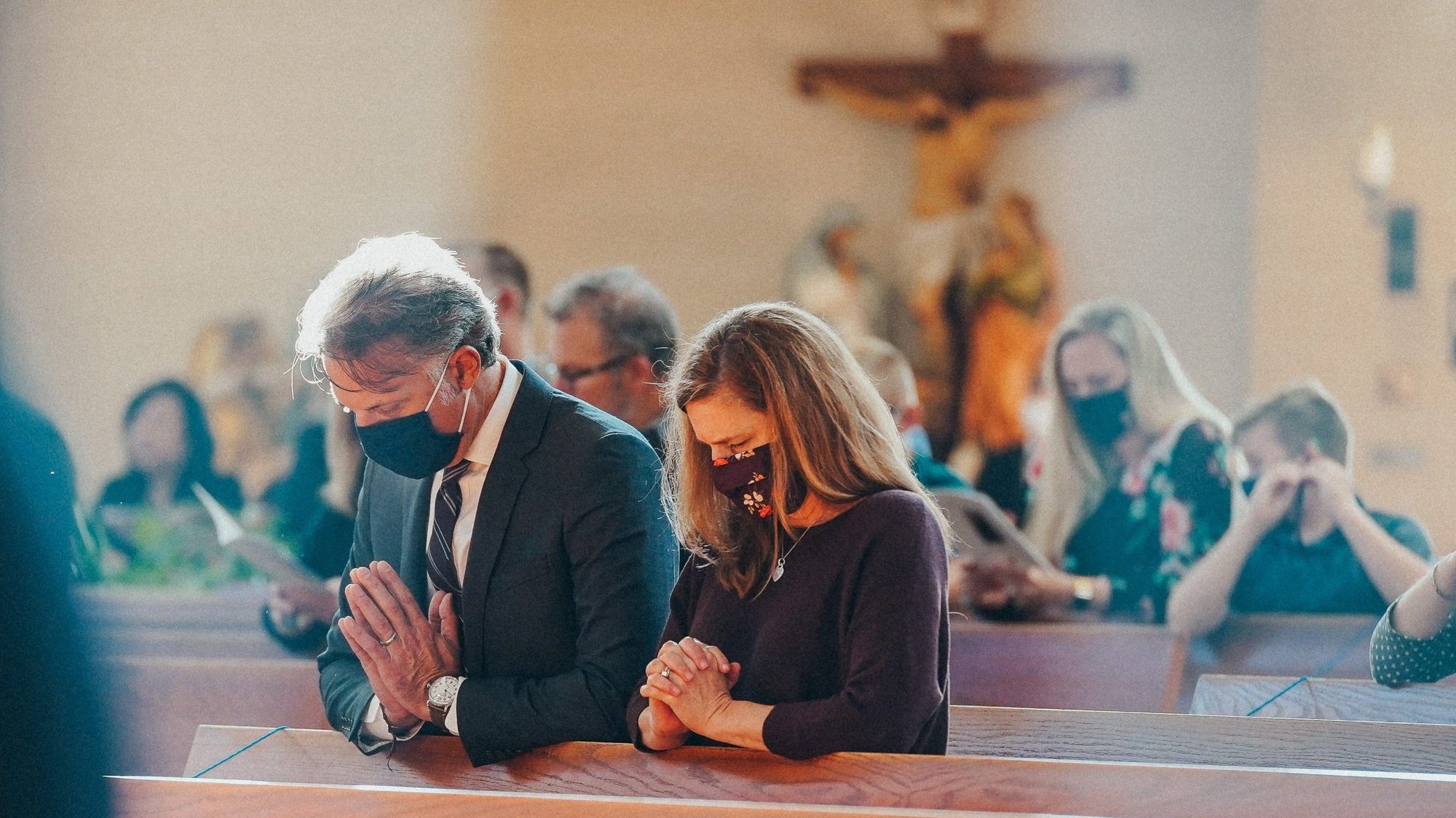 People pray at Our Lady of Good Counsel Parish in Plymouth, Mich., Nov. 24, 2020. Under the new "family of parishes structure, each individual parish in the Archdiocese of Detroit would retain its identity, but would work more closely with neighboring parishes. (CNS photo/Valaurian Waller, Detroit Catholic)