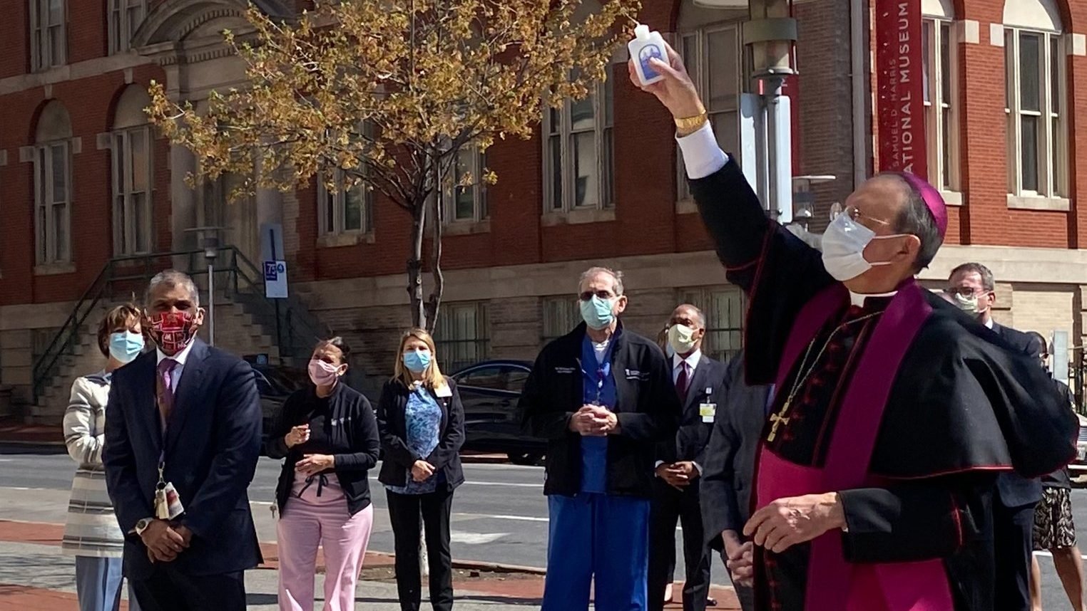 Baltimore Archbishop William E. Lori blesses the University of Maryland Medical Center in Baltimore April 8, 2020, amid the coronavirus pandemic. (CNS photo/Kevin J. Parks, Catholic Review)