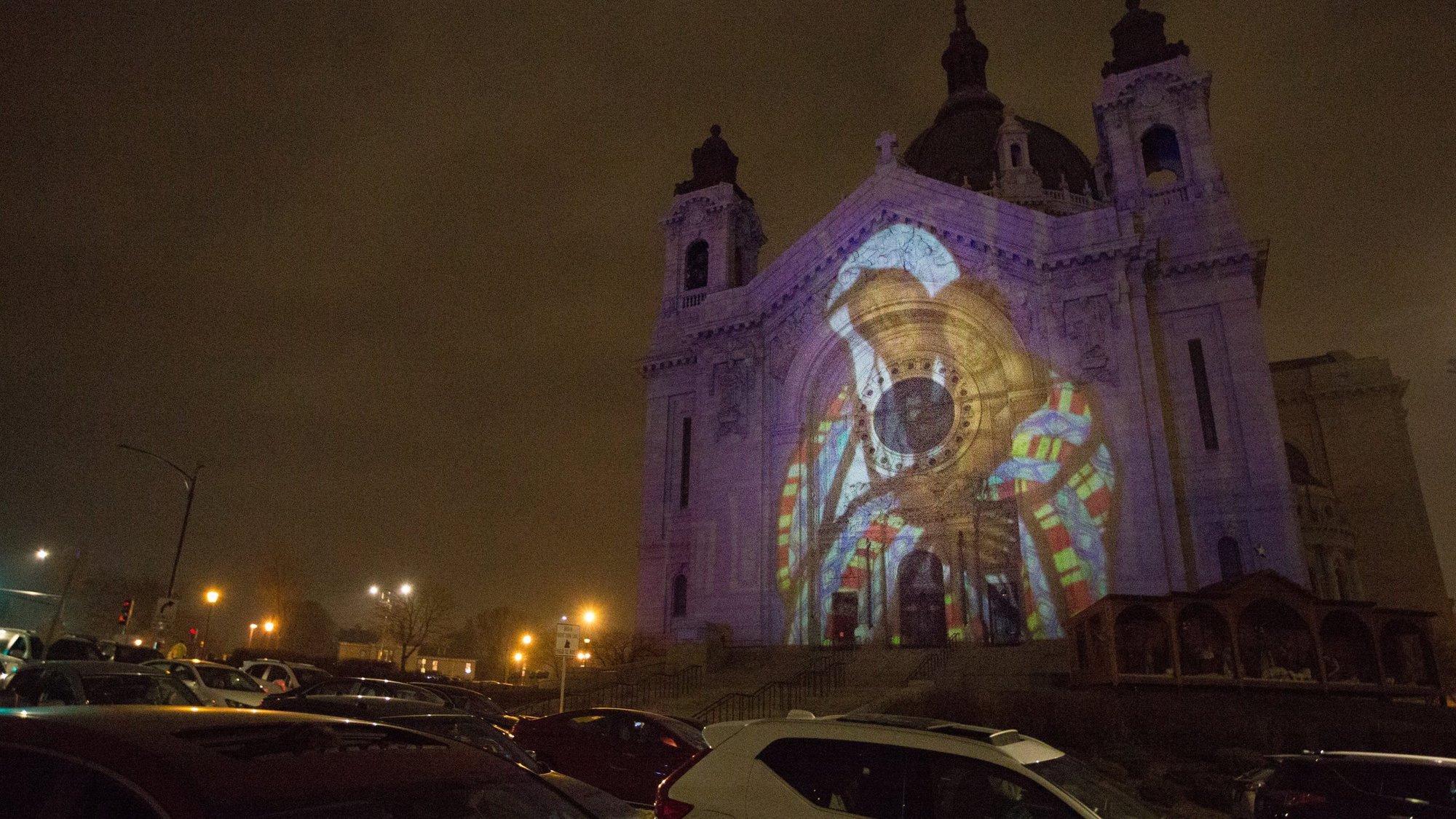 An image of Mary with Jesus is reflected on the Cathedral of St. Paul in St. Paul, Minn., Dec. 17, 2020. The presentation was part of a Luxmuralis light and sound show that was set to run through Dec. 19. (CNS photo/Dave Hrbacek, The Catholic Spirit)