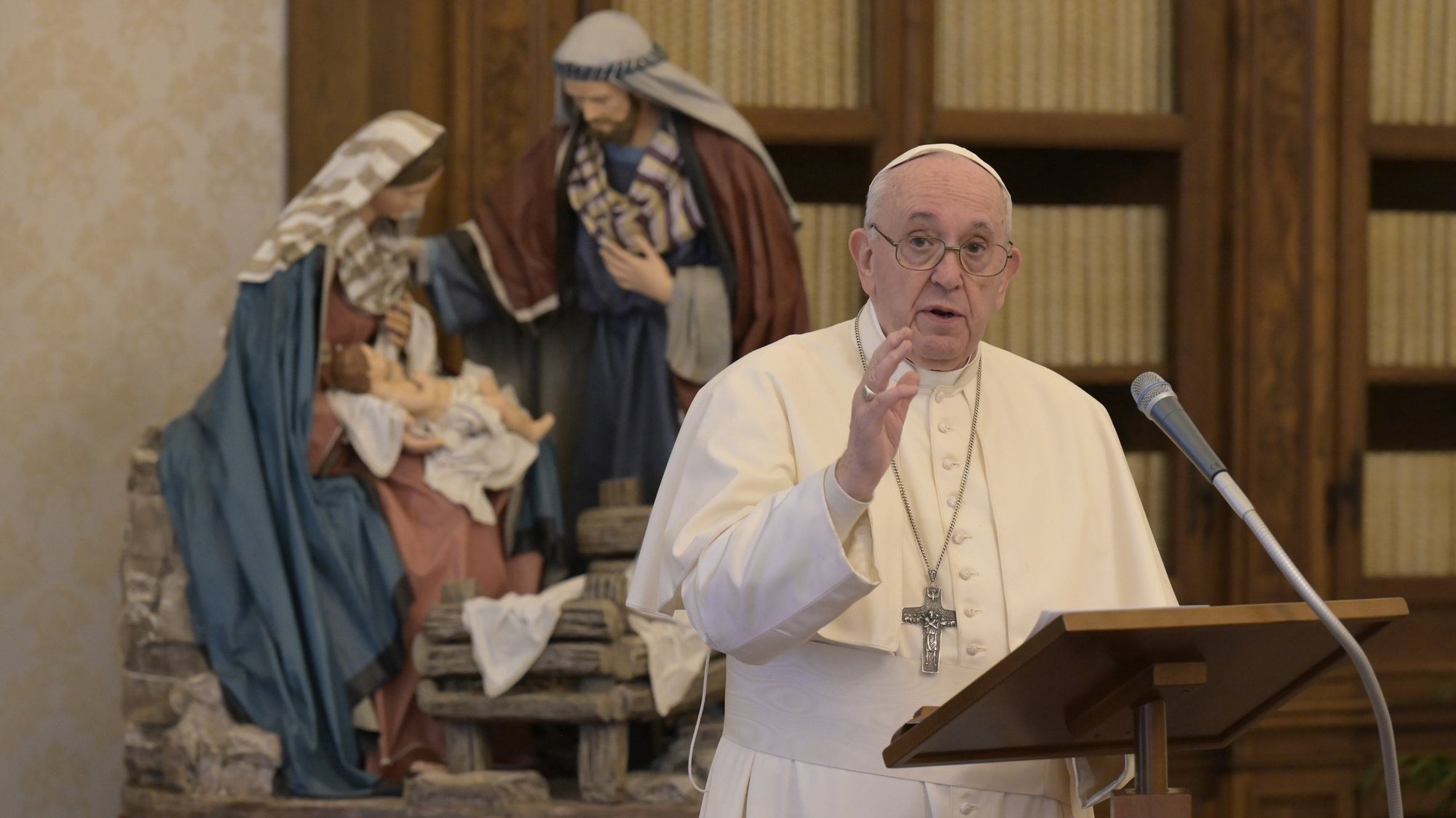 Pope Francis leads the recitation of the Angelus from the library of the Apostolic Palace at the Vatican Jan. 1, 2021. The pope's Angelus address for the feast of Mary, Mother of God, and World Peace Day focused on God's call for each person to make a contribution to peace at home, at work and among nations. (CNS photo/Vatican Media)
