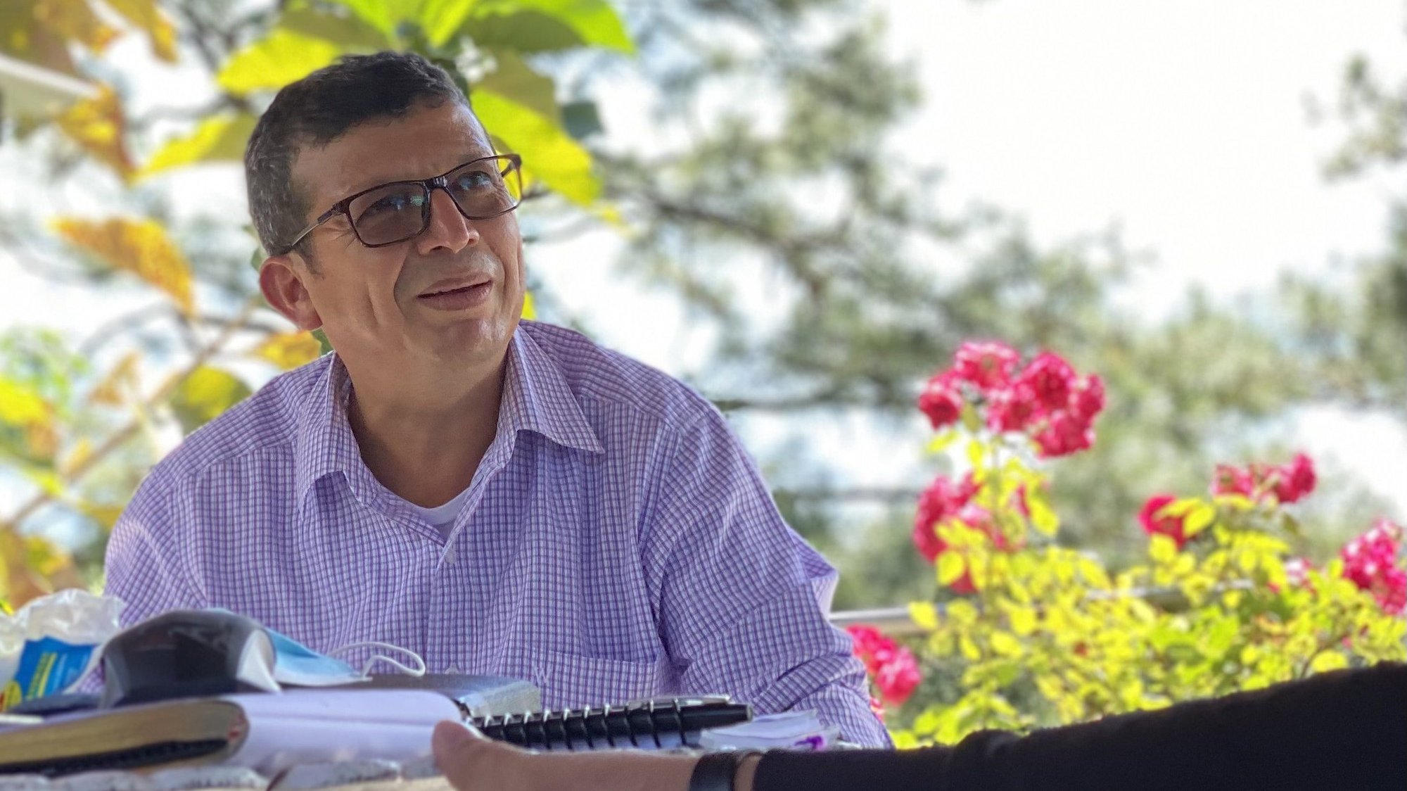 Father Manuel Acosta, professor of theology at El Salvador's Jose Simeón Cañas Central American University, speaks with seminarians Dec. 14, 2020 in San Ignacio, El Salvador. Father Acosta, as a theologian, was a teacher and later a colleague to three priests who were assassinated in El Salvador within the last three years. He wants civil and church authorities do more to investigate the crimes. (CNS photo/Rhina Guidos)