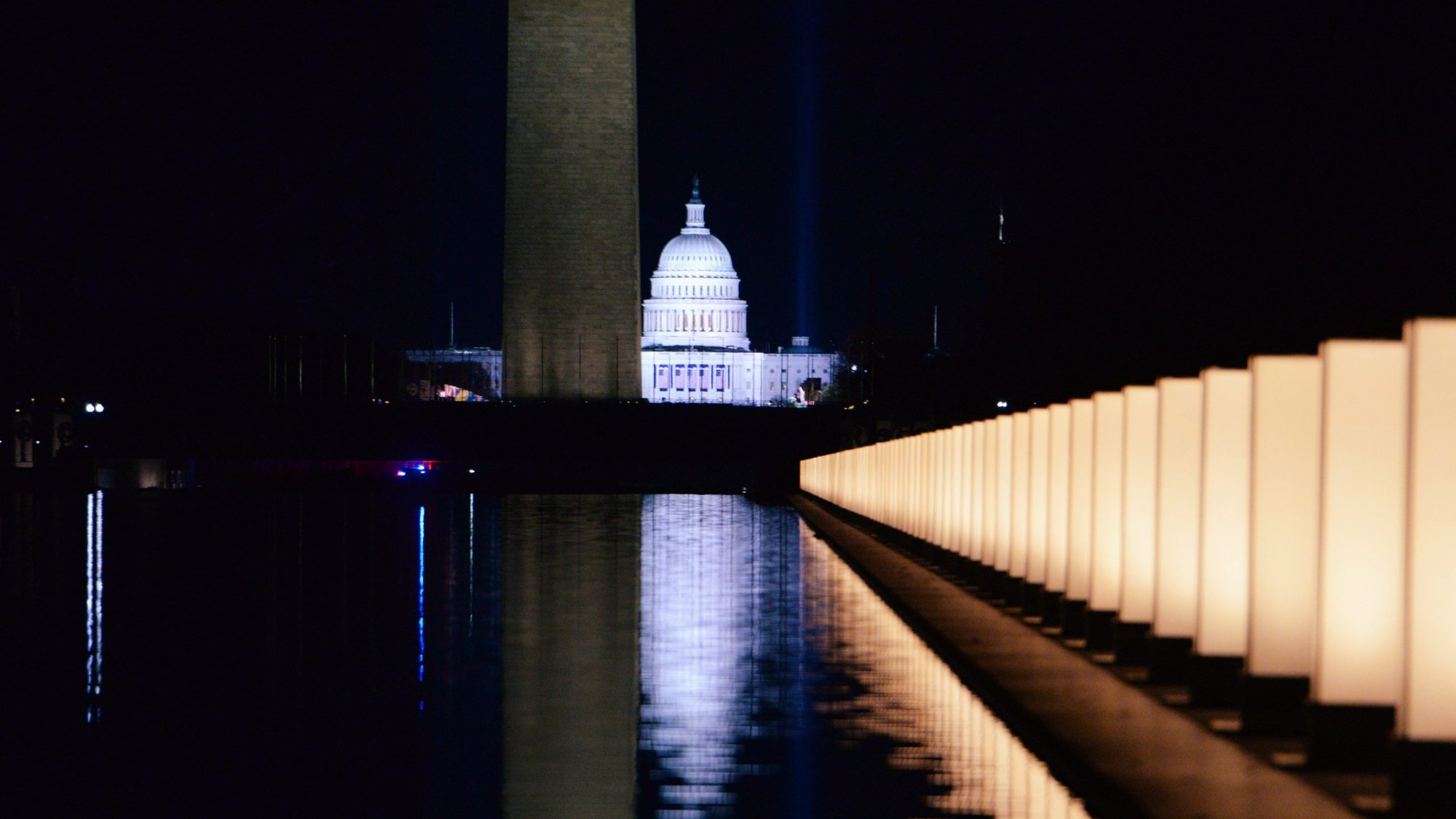 The U.S. Capitol is seen reflected at the reflecting pool at the Lincoln Memorial in Washington Jan. 19, 2021, after President-elect Joe Biden hosted a memorial honoring those who died from the coronavirus disease. (CNS photo/Callaghan O'Hare, Reuters)
