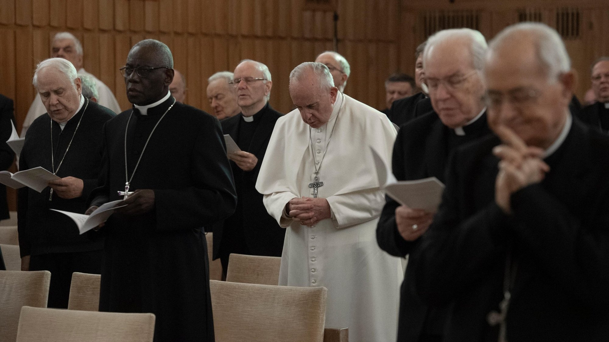 Pope Francis prays during his Lenten spiritual exercises in Ariccia, south of Rome in this March 15, 2019, file photo. The annual Lenten retreat for the pope and top Vatican officials has been canceled because of the ongoing pandemic. (CNS photo/Vatican Media)