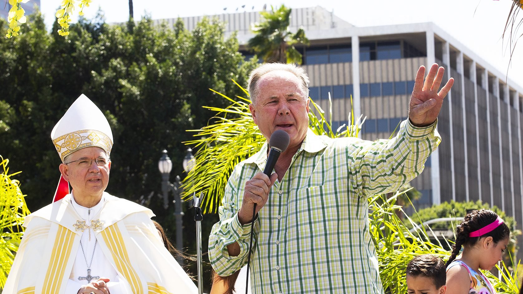 Former LA City Councilman Tom LaBonge with Archbishop Jose H. Gomez at the annual Blessing of the Animals celebration on Holy Saturday in April 2014. (Victor Alemán)
