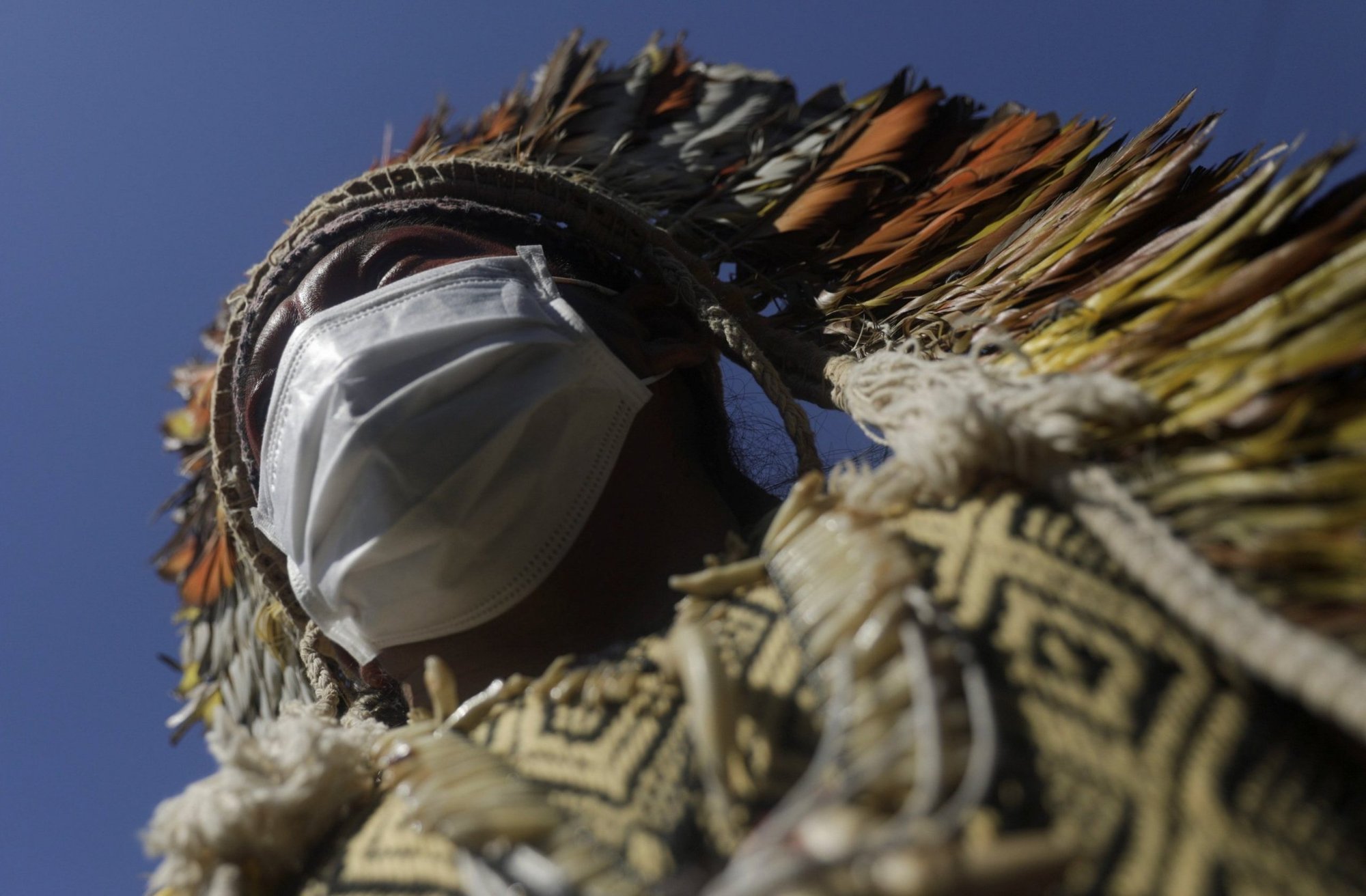 Indigenous leader Ninawa Huni Kui attends a protest in Rio de Janeiro Dec. 4, 2020. Demonstrators objected to the auction of oil and gas blocks in the Amazon. (CNS photo/Ricardo Moraes, Reuters)