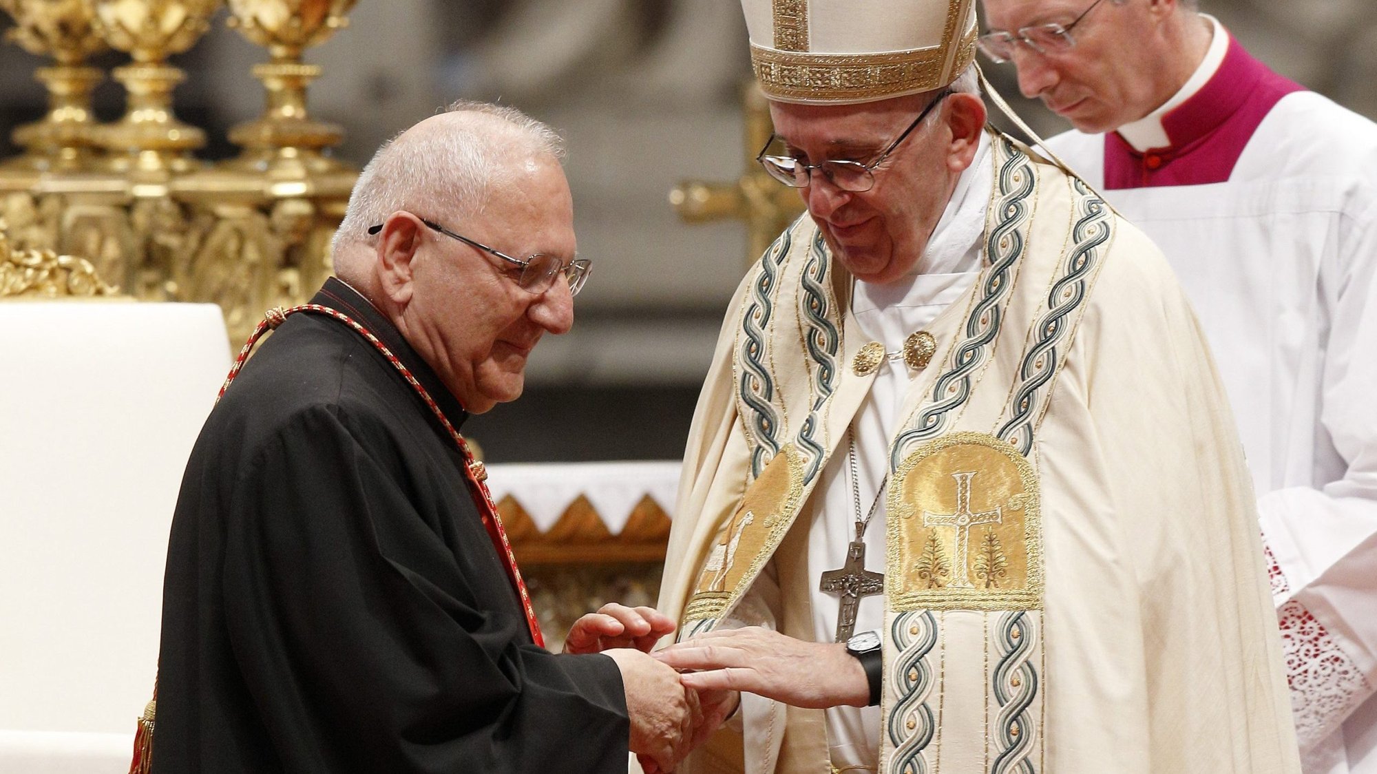 Pope Francis greets Cardinal Louis Sako, the Baghdad-based patriarch of the Chaldean Catholic Church, during a consistory at the Vatican in this June 28, 2018, file photo. Pope Francis plans to visit Iraq March 5-8, 2021. (CNS photo/Paul Haring)