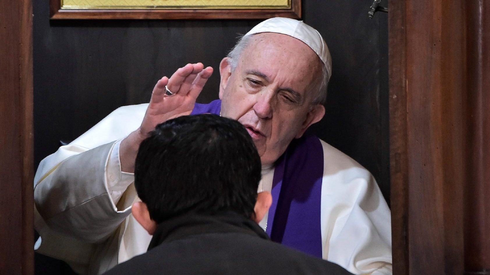 Pope Francis hears the confession of a priest at the Basilica of St. John Lateran in Rome in this March 7, 2019, file photo. In his message for Lent, Pope Francis said the season is "a time for renewing faith, hope and love." (CNS photo/Vatican Media)