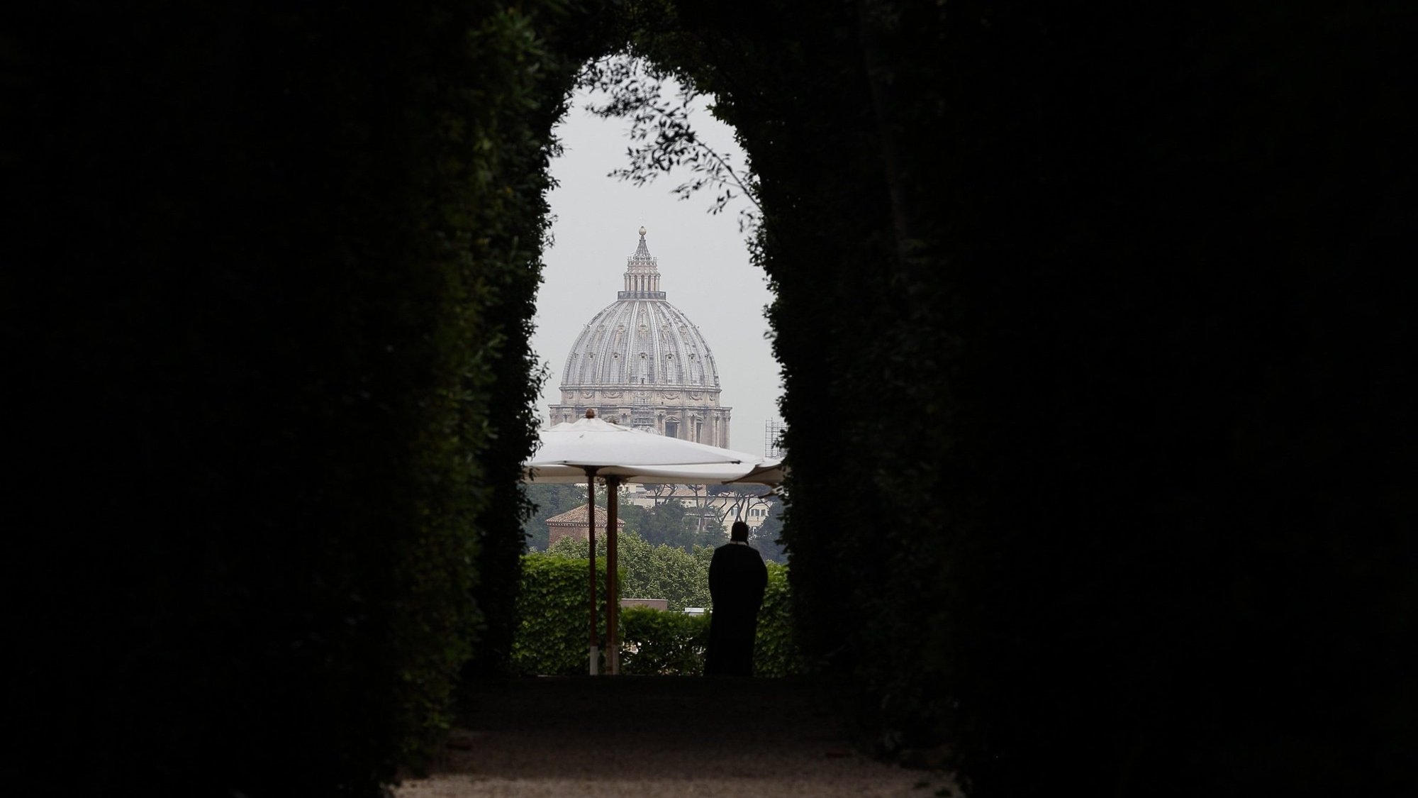 The dome of St. Peter's Basilica at the Vatican is seen from the Aventine Hill in Rome in this May 2, 2018, file photo. In the wake of the economic fallout due to the COVID-19 pandemic, the Vatican Secretariat for the Economy said Pope Francis signed off on the 2021 budget and that it expects a multimillion-dollar deficit for the year. (CNS photo/Paul Haring)