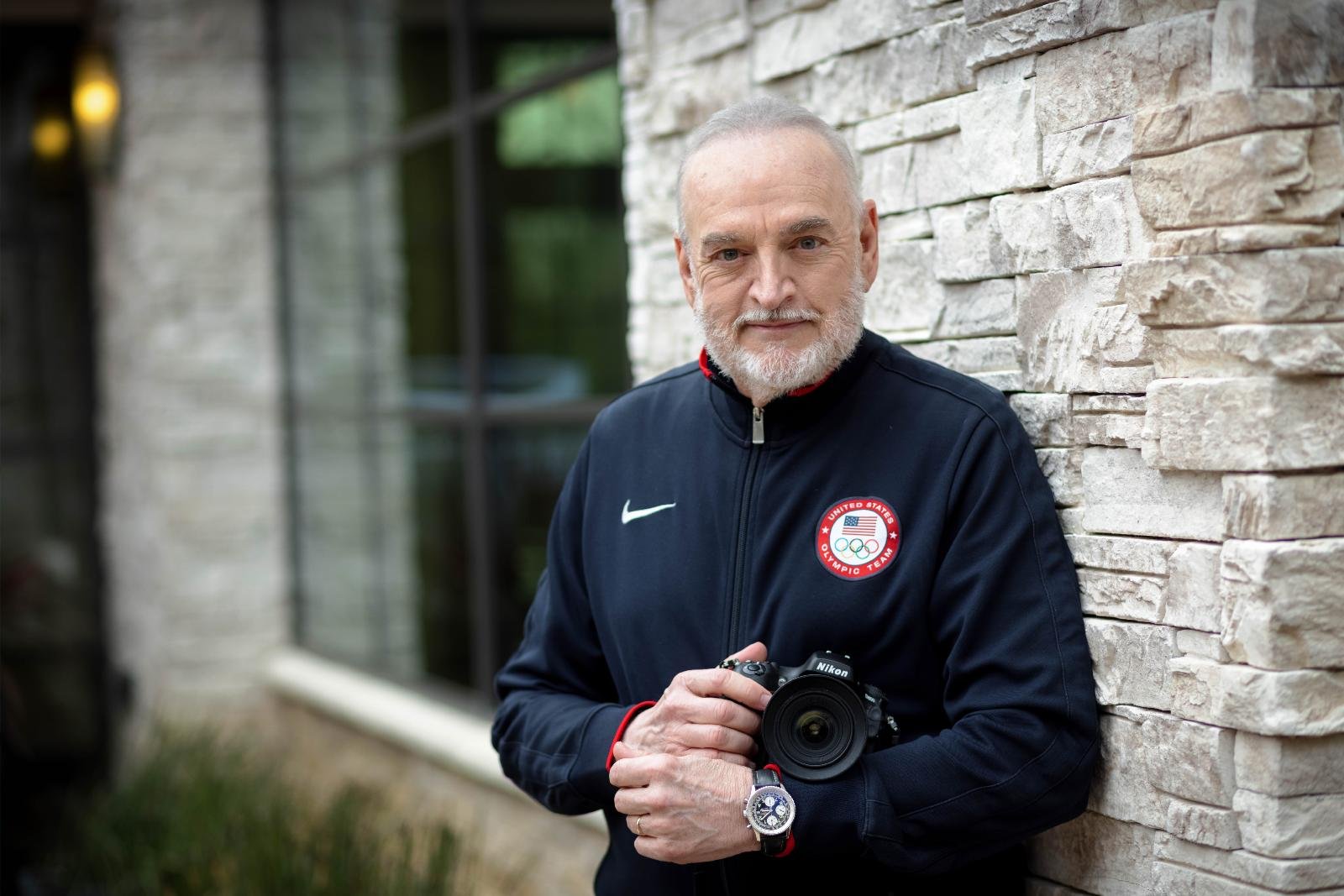 Ron St. Angelo, who was the official photographer for the NFL's Dallas Cowboys for more than three decades, poses at his home in Grapevine Feb. 26, 2021. (CNS photo/Kevin Bartram, The Texas Catholic)