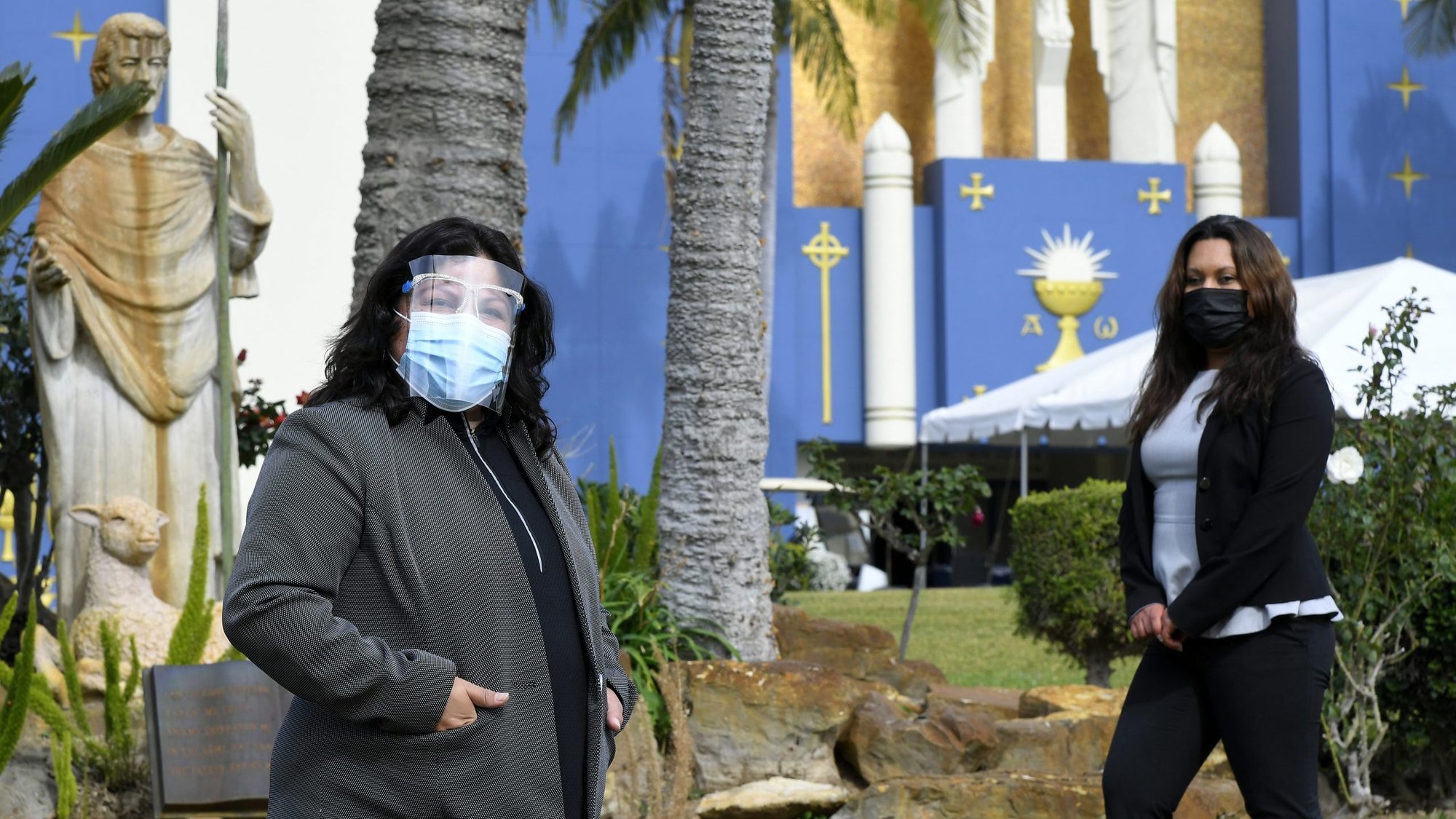 Holy Cross funeral directors Griselda Caldera (left) and Elli Alcula (right) have had to make adjustments to funeral planning due to COVID-19. (John McCoy)