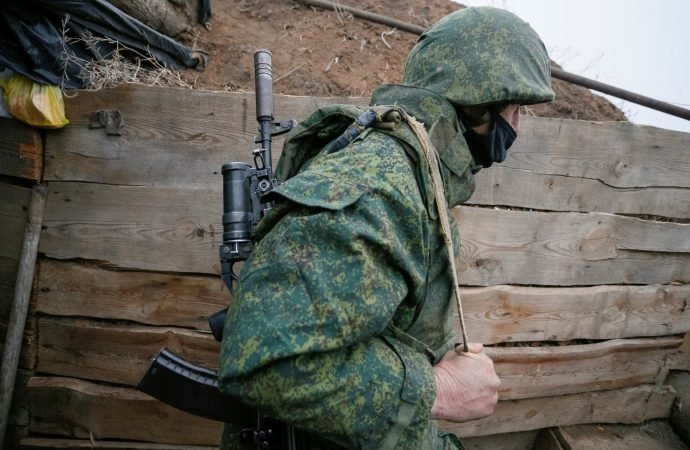 A militant of the separatist Donetsk People's Republic is seen at frontline positions located on the troops contact line with Ukrainian forces near the Ukrainian village of Leninsko Dec. 18, 2020. In an interview with a Polish agency, Archbishop Sviatoslav Shevchuk of Kyiv-Halych, Ukraine, said blocked aid and continued corruption are problems confronting his country. (Alexander Ermochenko/Reuters via CNS)