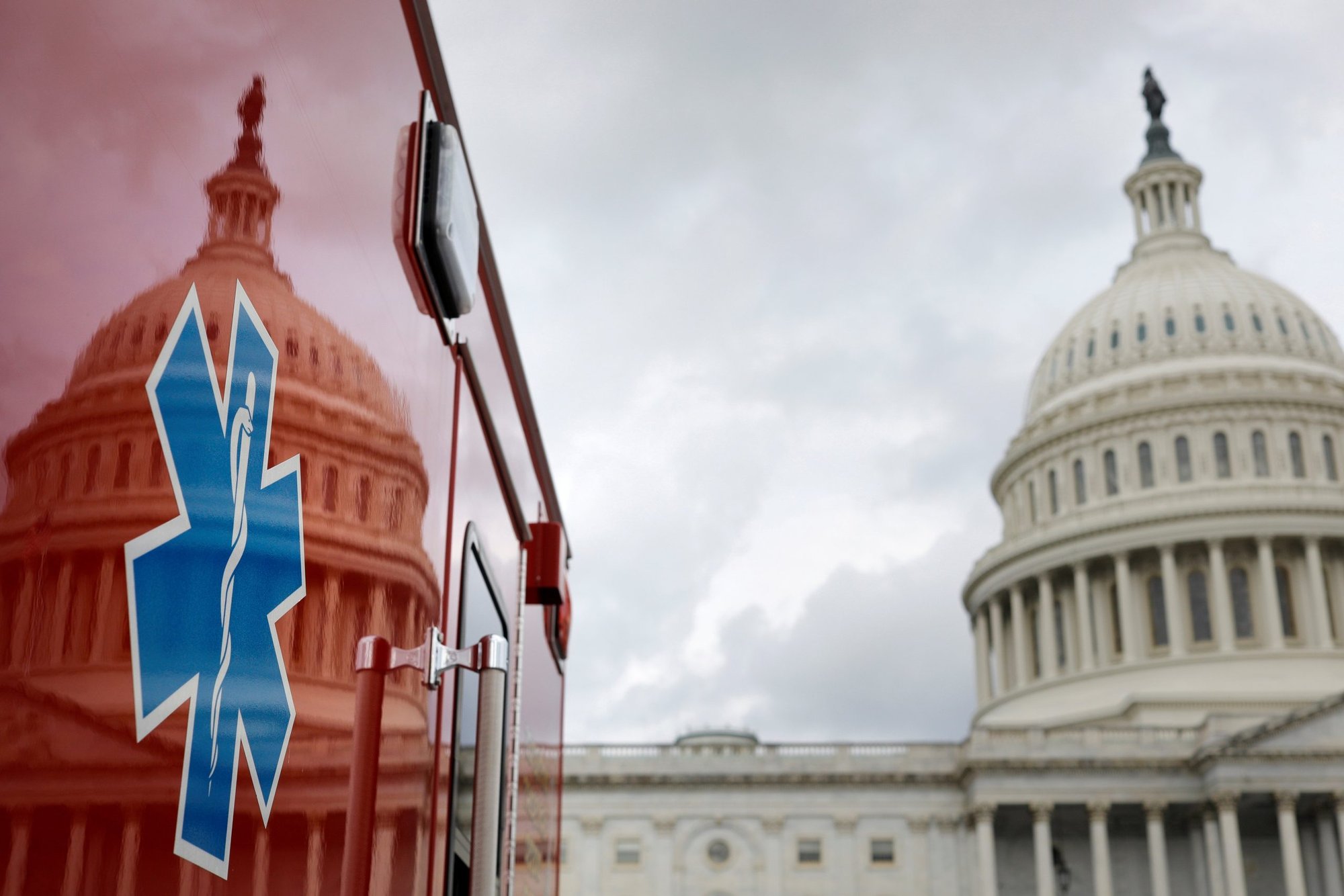 The U.S. Capitol is reflected on an ambulance in Washington July 16, 2020. (CNS photo/Tom Brenner, Reuters)