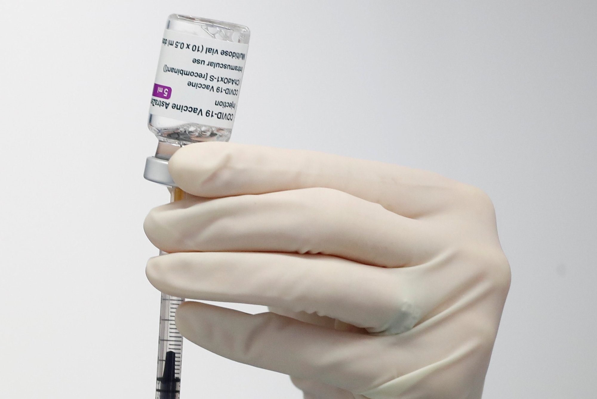 A nurse prepares a dose of AstraZeneca COVID-19 vaccine in Fasano, Italy, April 13, 2021. (CNS photo/Alessandro Garofalo, Reuters)