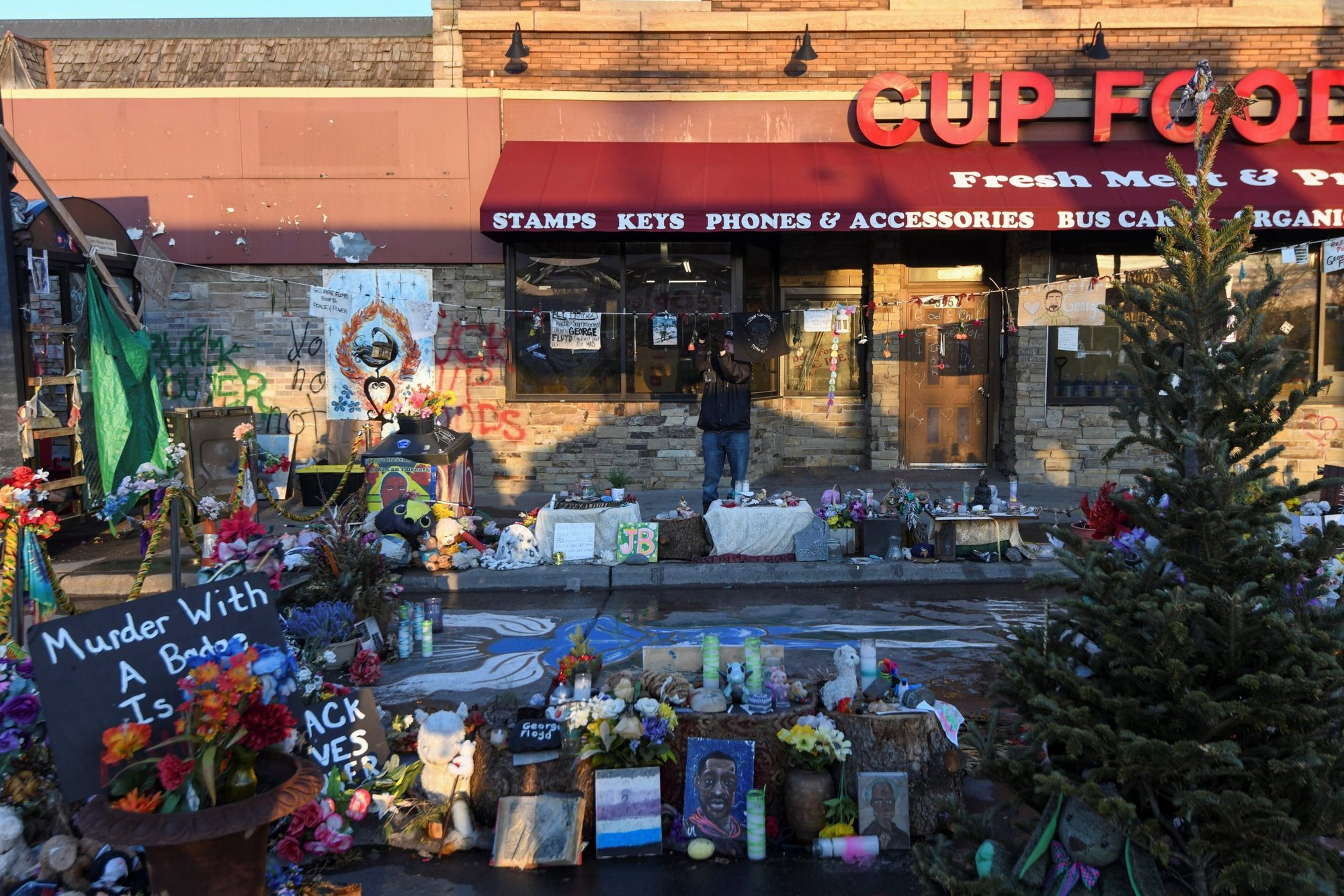 A memorial for George Floyd is seen in Minneapolis March 4, 2021. After about 10 hours of deliberation, jurors released their verdict April 20 convicting former Minneapolis police officer Derek Chauvin of second-degree unintentional murder, third-degree murder and second-degree manslaughter in the death of George Floyd. (CNS photo/Nicholas Pfosi, Reuters)