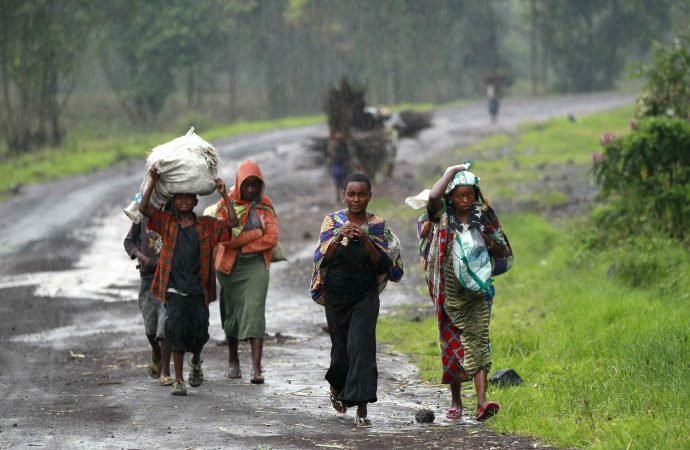 Displaced people are seen in a file photo along a road near Goma, Congo. (Thomas Mukoya/Reuters via CNS)