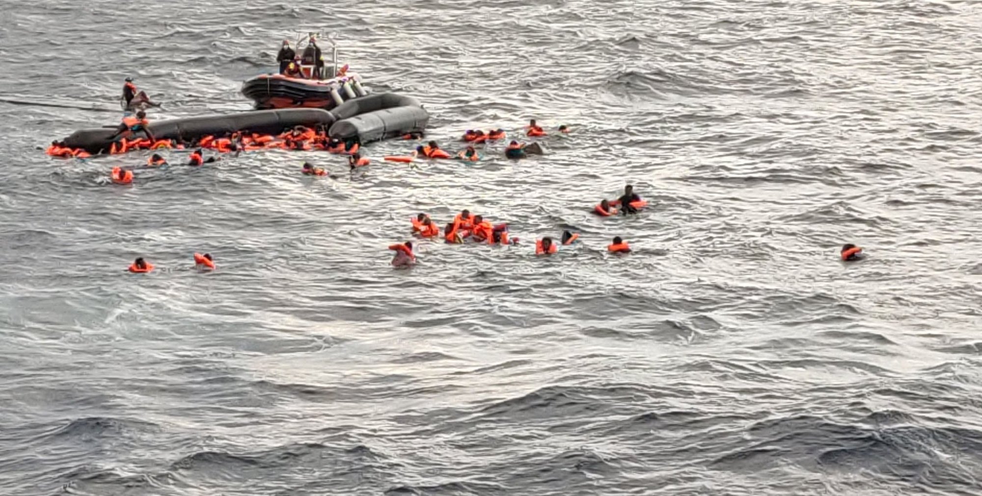 A still image taken from a video shows migrants at sea waiting to be rescued by Spanish search-and-rescue ship Open Arms in the Mediterranean Sea Nov. 11, 2020. (CNS photo/Open Arms handout via Reuters)