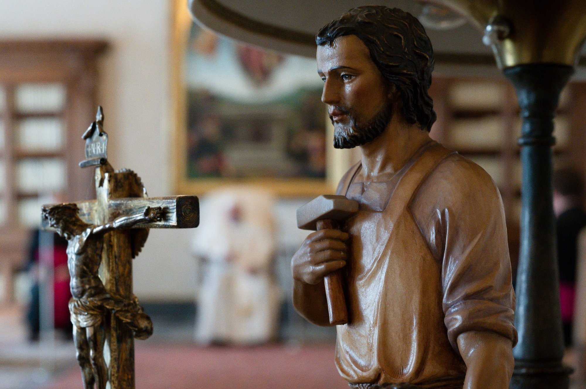 A statue of St. Joseph is seen as Pope Francis leads his general audience at the Vatican March 24, 2021. With the approval of the pope, the Congregation for Divine Worship and the Sacraments has published several additions to the Litany of St. Joseph. (CNS photo/Vatican Media)