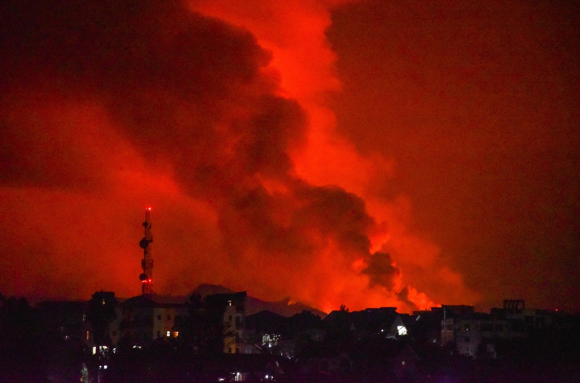 A general view shows smoke and flames at the volcanic eruption of Mount Nyiragongo near Goma, Congo, May 22, 2021. (CNS photo/Olivia Acland, Reuters)