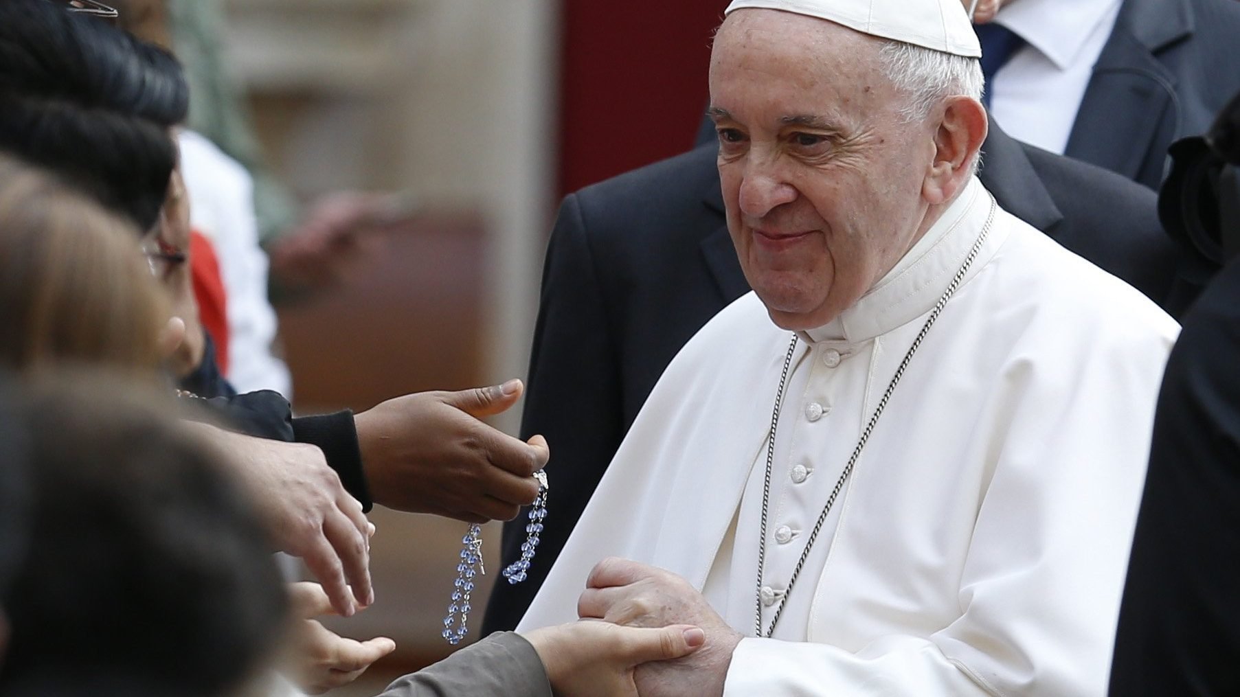 Pope Francis greets people during his general audience in the San Damaso Courtyard of the Apostolic Palace at the Vatican June 9, 2021. (CNS photo/Paul Haring)