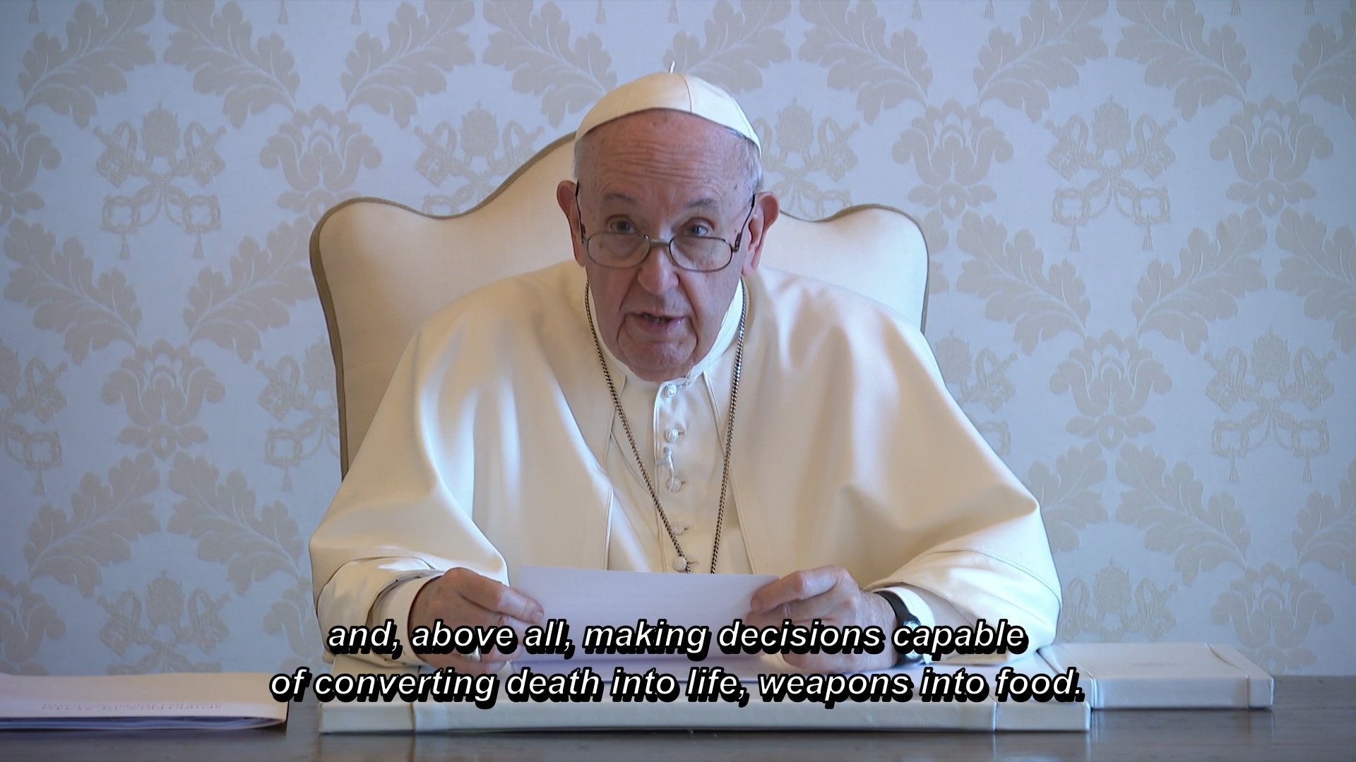 Pope Francis speaks in a video message to the GLOBSEC Bratislava Forum in this still from a video released by the Vatican June 15, 2021. The pope told the forum of Central and East European leaders that post-pandemic plans must aim to "convert death into life, weapons into food." (CNS photo/Vatican Media)