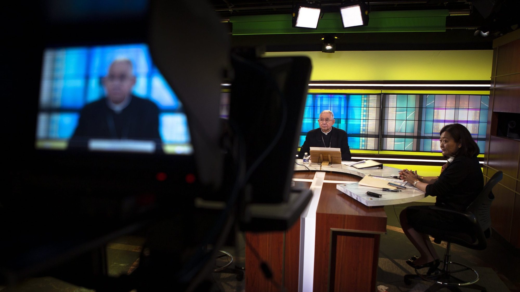 Archbishop José H. Gomez of Los Angeles, president of the U.S. Conference of Catholic Bishops, and Chieko Noguchi, USCCB director of public affairs, hold a news conference at the USCCB headquarters in Washington June 16, 2021, the first day of the bishops' three-day spring assembly, held virtually due to concern over COVID-19. (CNS photo/Tyler Orsburn)