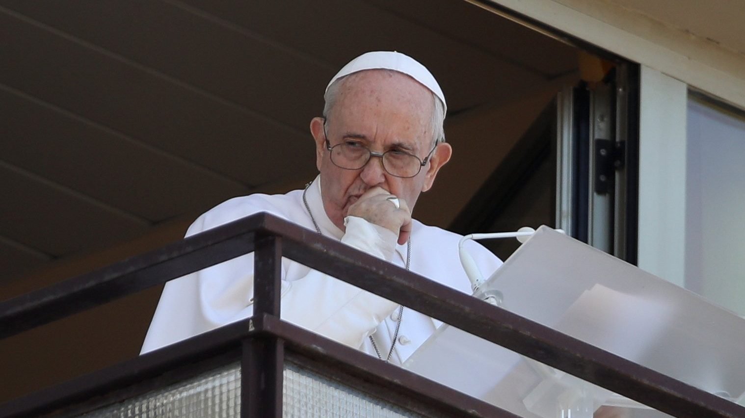 Pope Francis pauses as he leads the Angelus from a balcony of Gemelli hospital in Rome July 11, 2021, as he recovers following scheduled colon surgery. (CNS photo/Yara Nardi, Reuters)