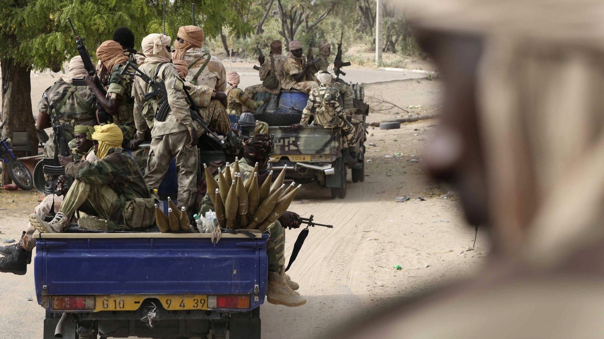Soldiers from Chad drive in the retaken town of Damasak, Nigeria, March 18, 2015. Armies from Nigeria, Cameroon, Chad and Niger launched an offensive to end Boko Haram's six-year campaign, which has killed thousands in northern Nigeria and spilled over into Cameroon and Niger. (CNS photo/Emmanuel Braun, Reuters)