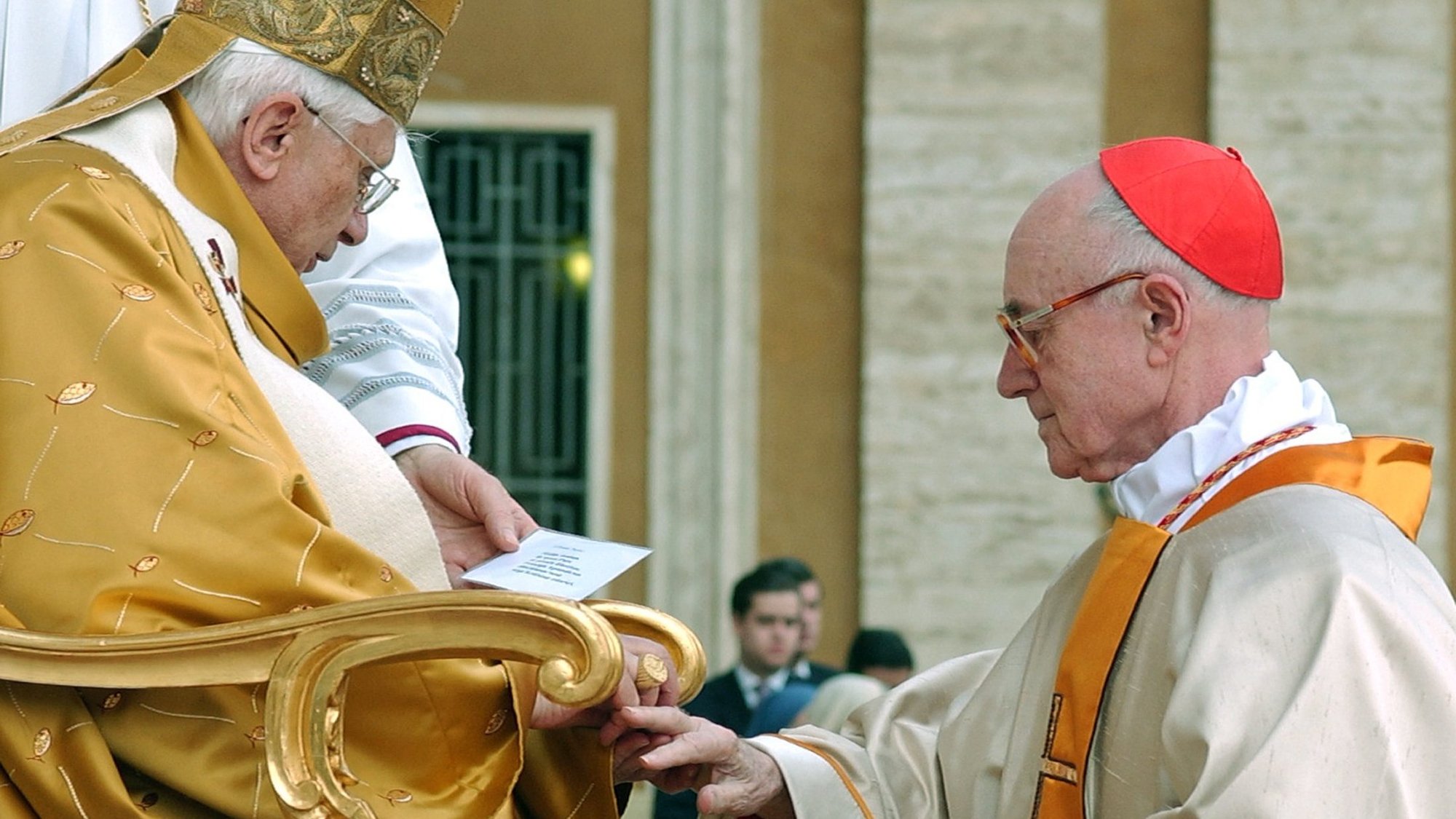 French Cardinal Albert Vanhoye of France receives his ring from then-Pope Benedict XVI during a consistory in St. Peter's Square at the Vatican March 25, 2006. Cardinal Vanhoye, a Scripture scholar and the oldest member of the College of Cardinals, died July 29, 2021, at the age of 98. (CNS photo/L'Osservatore Romano)