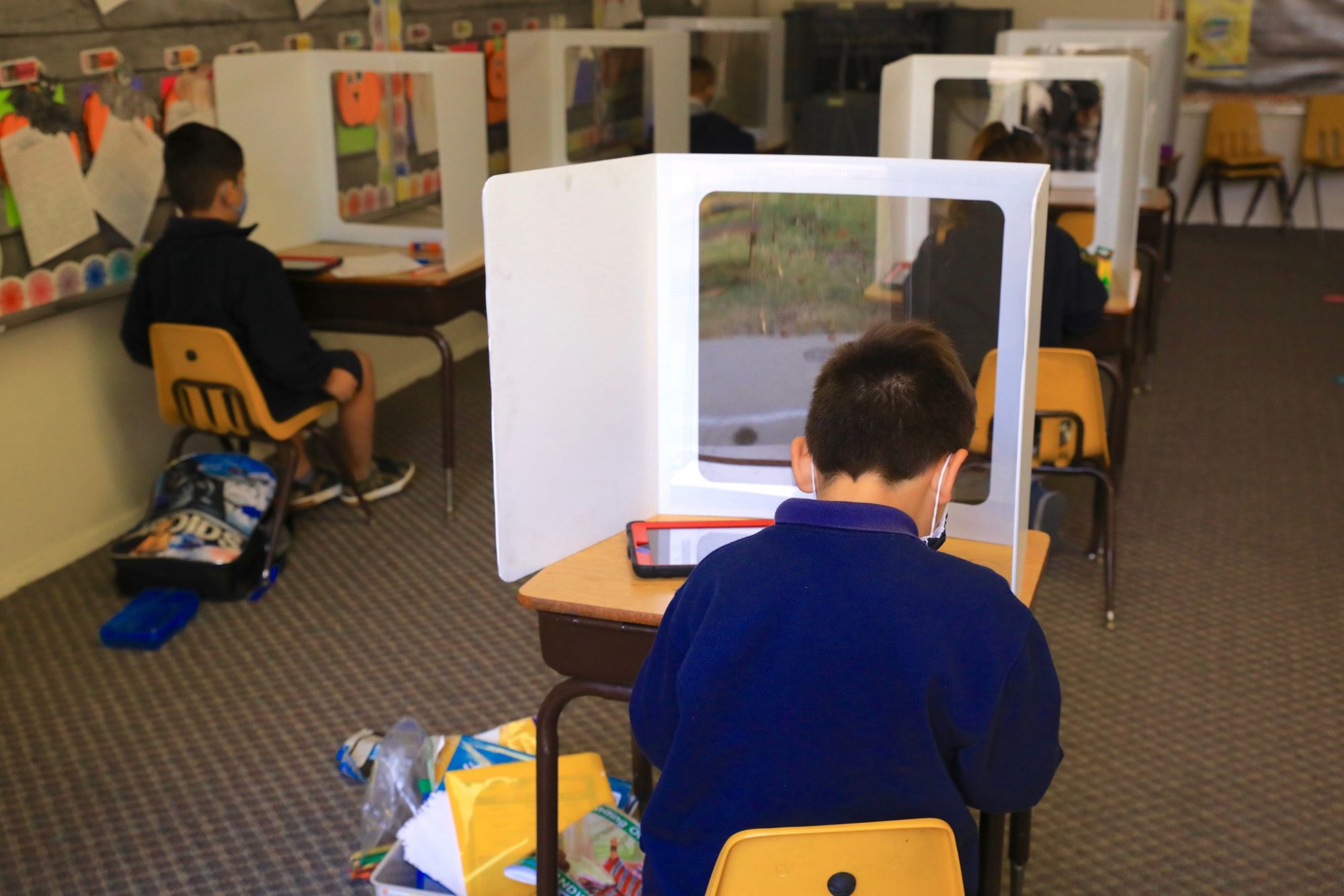 Students at St. Maria Goretti School in Long Beach on Oct. 26, 2020, the first day of in-person classroom instruction since the start of the pandemic. (David Amador Rivera)