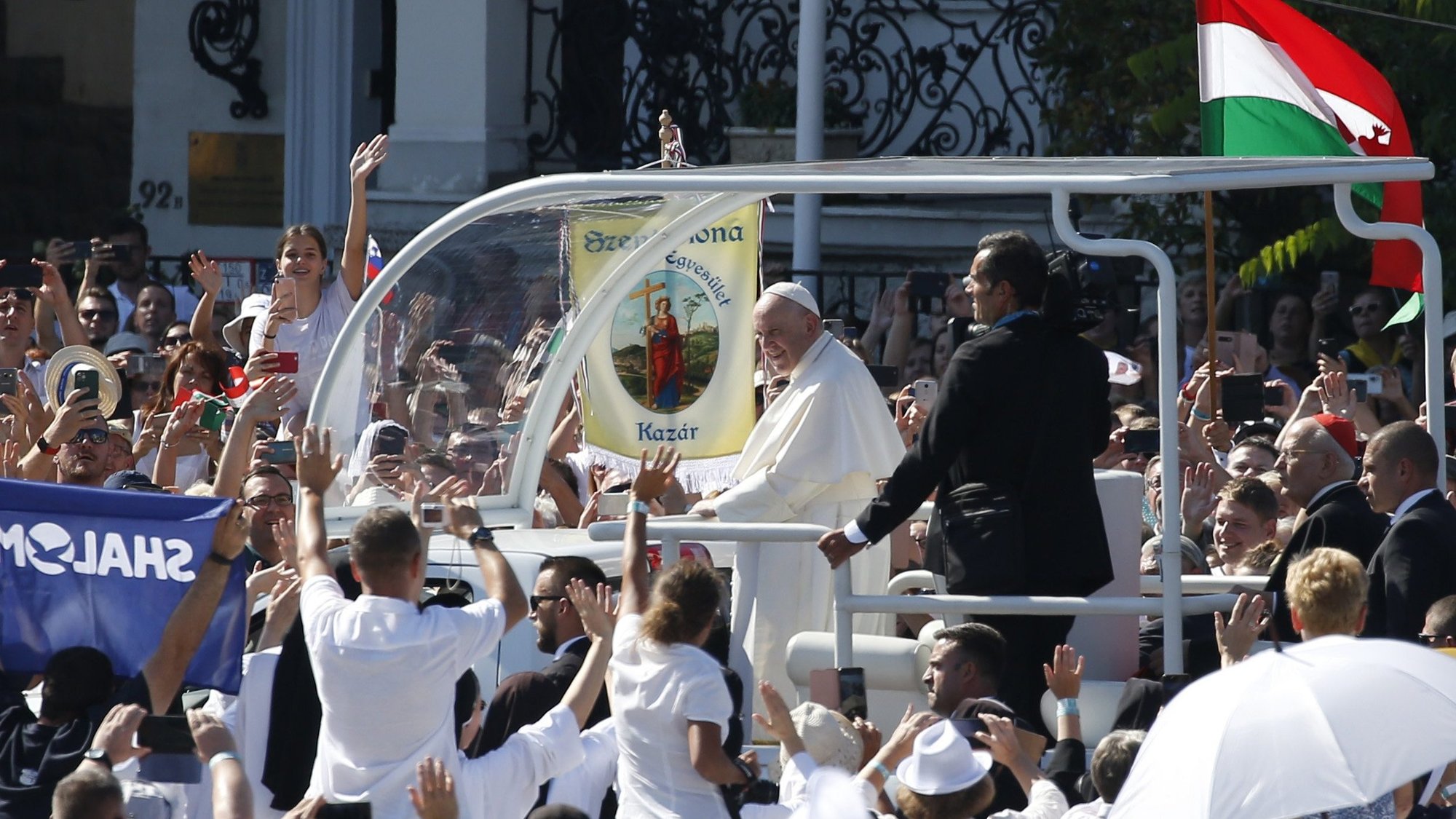 Pope Francis greets the crowd as he arrives to celebrate the closing Mass of the International Eucharistic Congress at Heroes' Square in Budapest, Hungary, Sept. 12, 2021. (CNS photo/Paul Haring)
