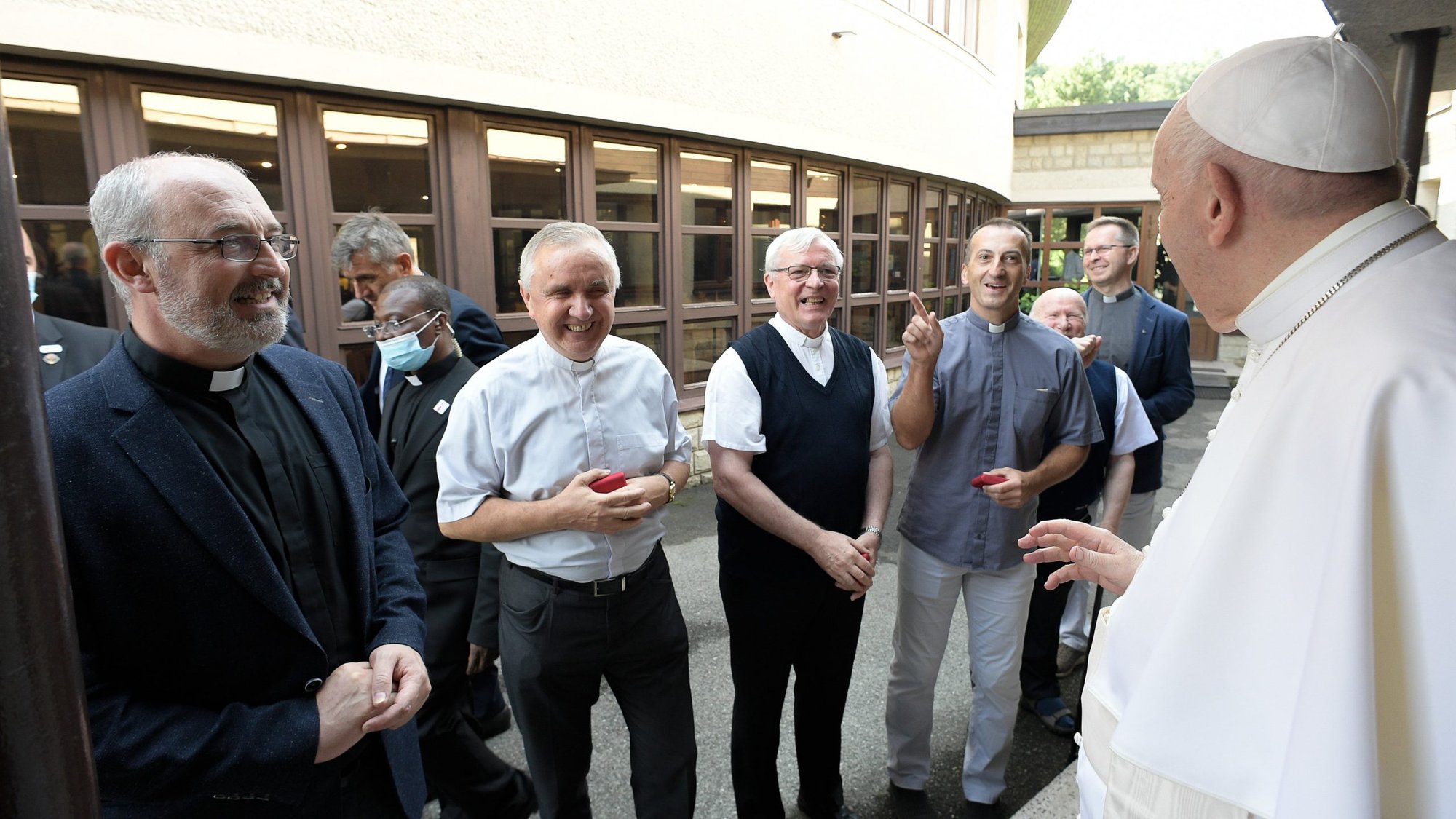 Pope Francis talks with members of the Society of Jesus at the apostolic nunciature in Bratislava, Slovakia, Sept. 12, 2021. During a private meeting, the pope spoke to the Jesuits about his health, the pastoral work of Jesuits in Slovakia, and how he deals with suspicions or criticisms. (CNS photo/Vatican Media)