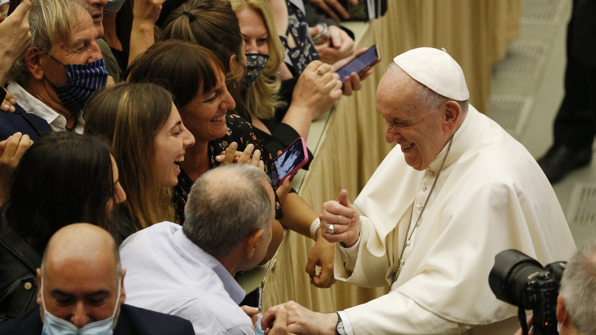 Pope Francis greets people during his general audience in the Paul VI hall at the Vatican Sept. 22, 2021. (CNS photo/Paul Haring)