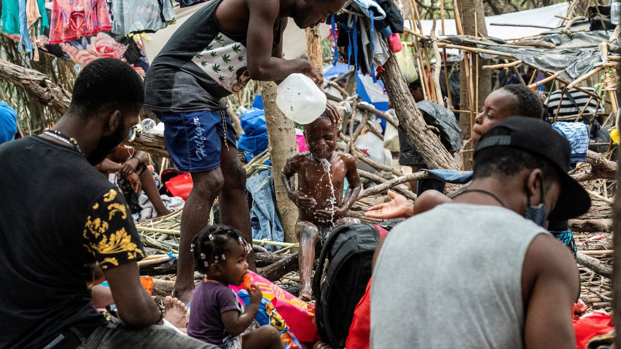 Migrants are seen at a makeshift camp in Del Rio, Texas, Sept. 21, 2021. (CNS photo/Go Nakamura, Reuters)