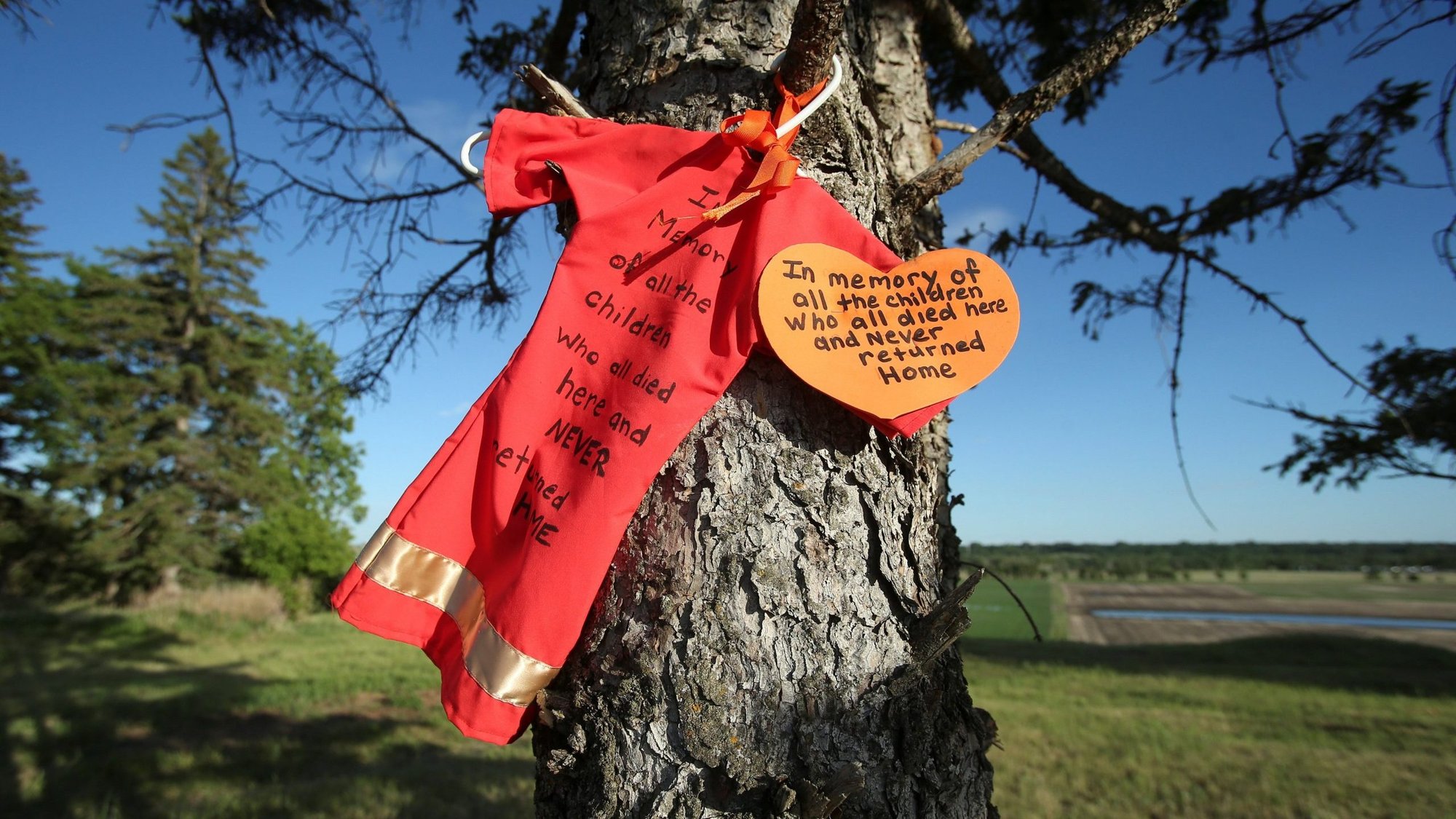 An offering is seen at the site of the former Brandon Indian Residential School June 12, 2021. Researchers -- partnered with the Sioux Valley Dakota Nation -- located 104 potential graves at the site in Brandon, Manitoba. On Sept. 24, Canada's Catholic bishops "unequivocally" apologized for the Catholic Church's role in the residential school system. (CNS photo/Shannon VanRaes, Reuters)