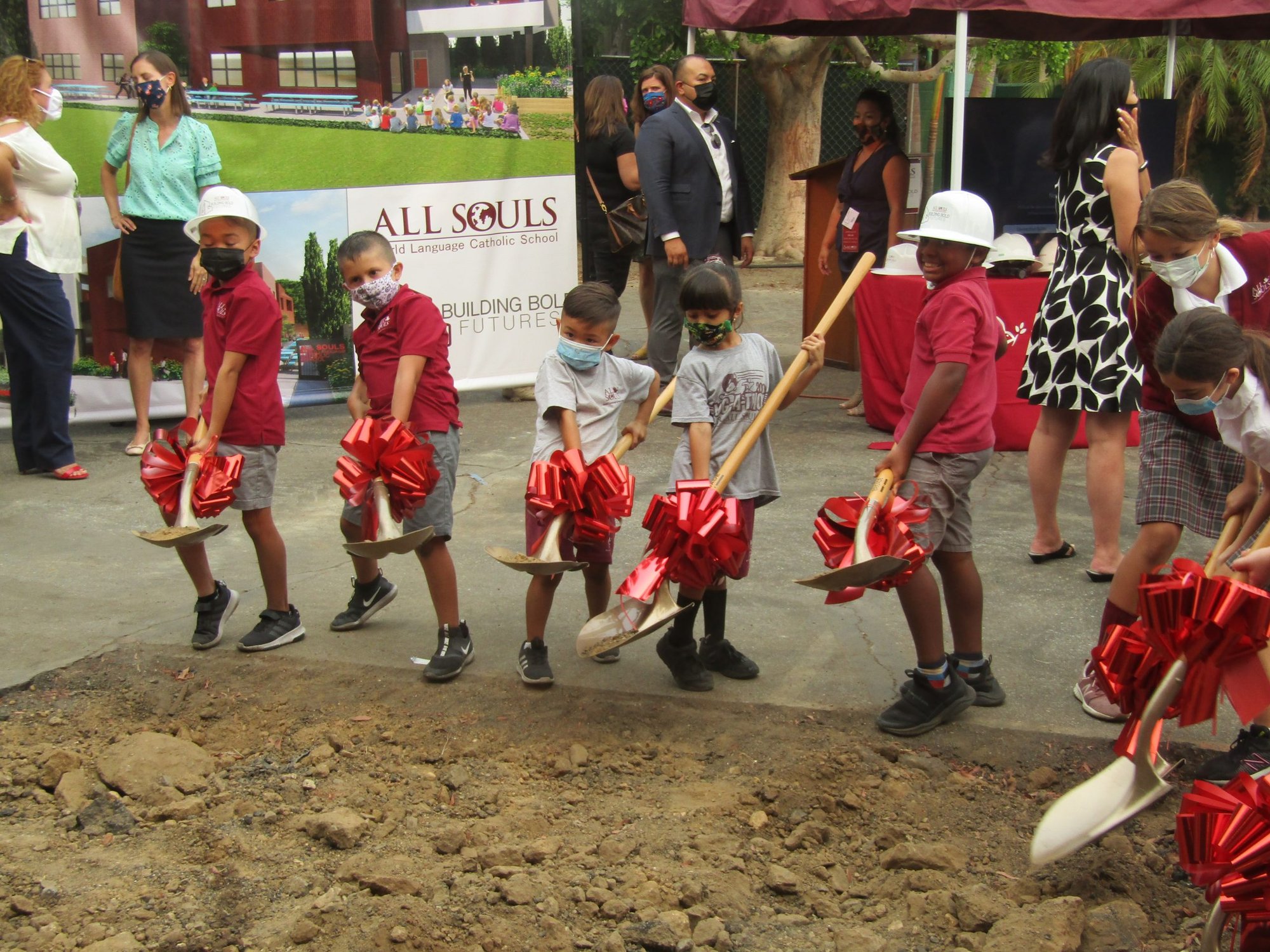 All Souls students “breaking ground” at the Sept. 23 ceremony. (Department of Catholic Schools)