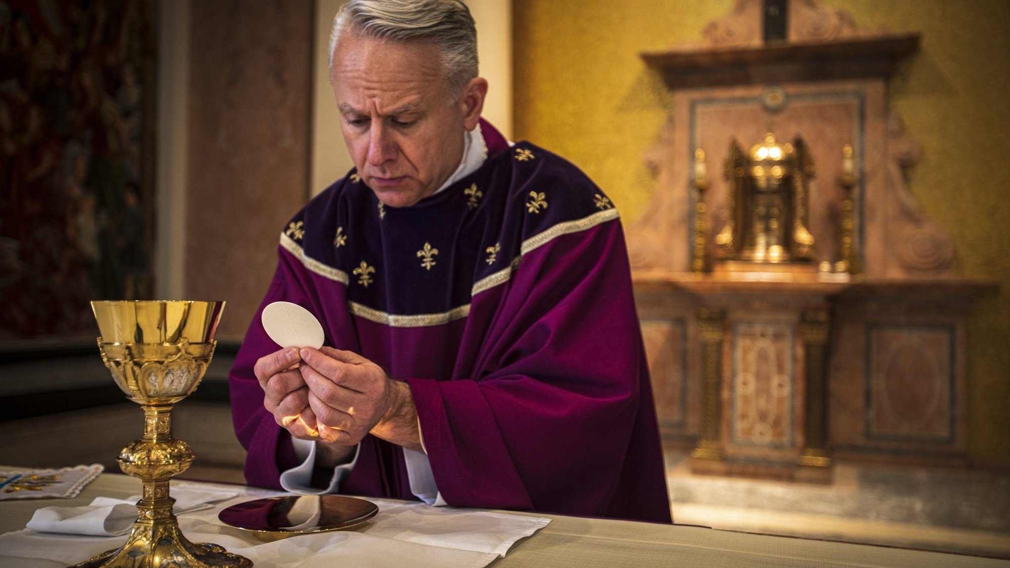 Father John C. Maria consecrates the Eucharist at the altar of the Cathedral of St. Catharine of Siena in Allentown, Pa., March 9, 2020. (CNS photo/Chaz Muth)
