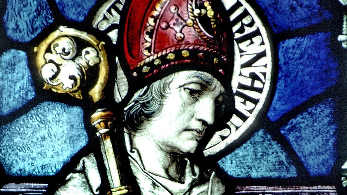 The likeness of St. Irenaeus of Lyon is pictured in a stained-glass window at the Basilica of Our Lady Immaculate in Guelph, Ontario. During an Oct. 7, 2021, meeting with members of the St. Irenaeus Joint Orthodox-Catholic Working Group, Pope Francis said he will soon declare St. Irenaeus a doctor of the church. (CNS photo/The Crosiers)
