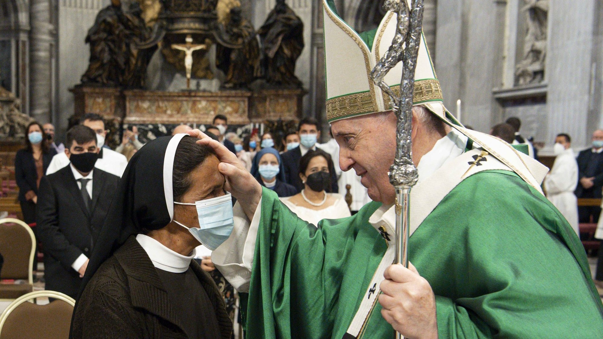Pope Francis blesses Sister Gloria Cecilia Narváez Argot, a member of the Franciscan Sisters of Mary Immaculate, at the end of Mass in St. Peter's Basilica at the Vatican Oct. 10, 2021. The sister, a missionary from Colombia, was kidnapped in Mali in 2017 and released in early October. (CNS photo/Vatican Media)