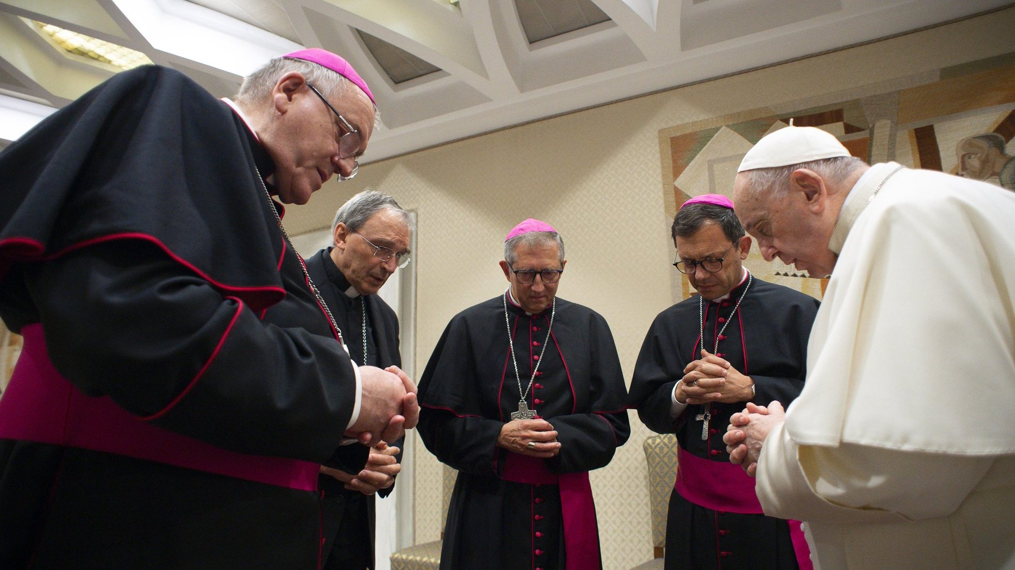 Pope Francis and four French bishops gather for silent prayer for victims of abuses committed by members of the clergy, prior to the pope's general audience at the Vatican Oct. 6, 2021. The bishops were visiting Rome following a report on sexual abuse in France that estimates more than 200,000 children were abused by priests since 1950, and more than 100,000 others were abused by lay employees of church institutions. (CNS photo/Vatican Media)