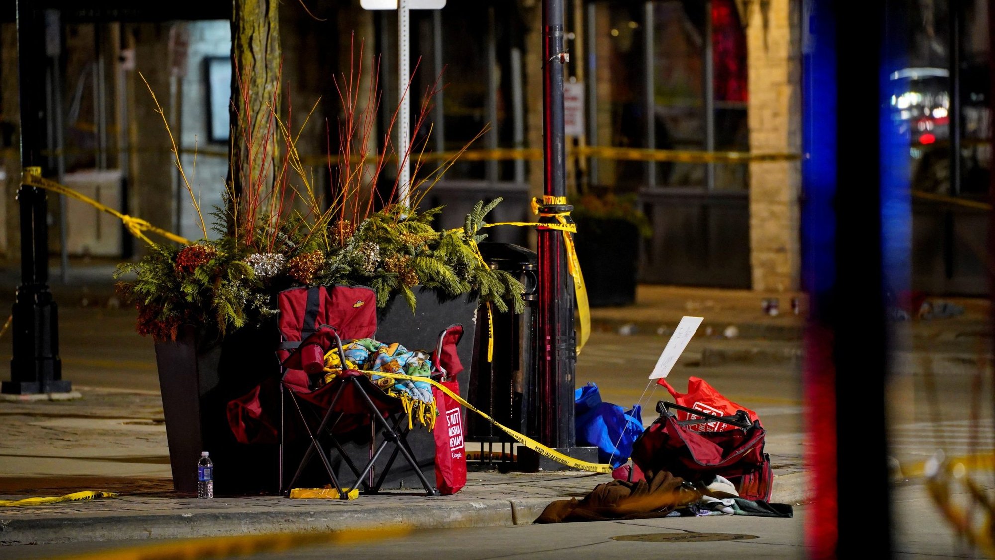 Chairs left abandoned are seen Nov. 22, 2021, after a car plowed through the Waukesha Christmas Parade in Waukesha, Wis., at about 4:39 p.m. local time Nov. 21. (CNS photo/Cheney Orr, Reuters)