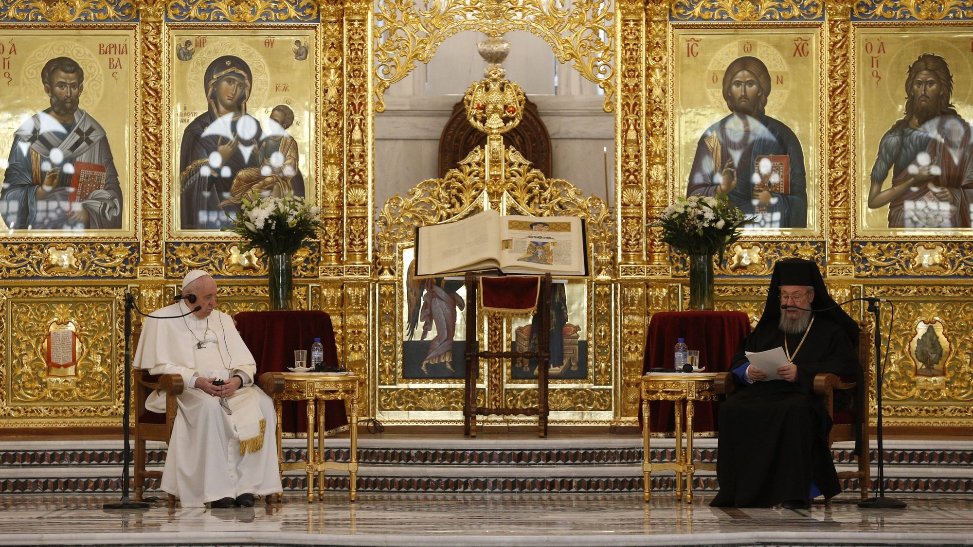 Pope Francis and Orthodox Archbishop Chrysostomos II of Cyprus attend a meeting with the Orthodox bishops who are members of the Holy Synod at the Orthodox cathedral in Nicosia, Cyprus, Dec. 3, 2021. (CNS photo/Paul Haring)