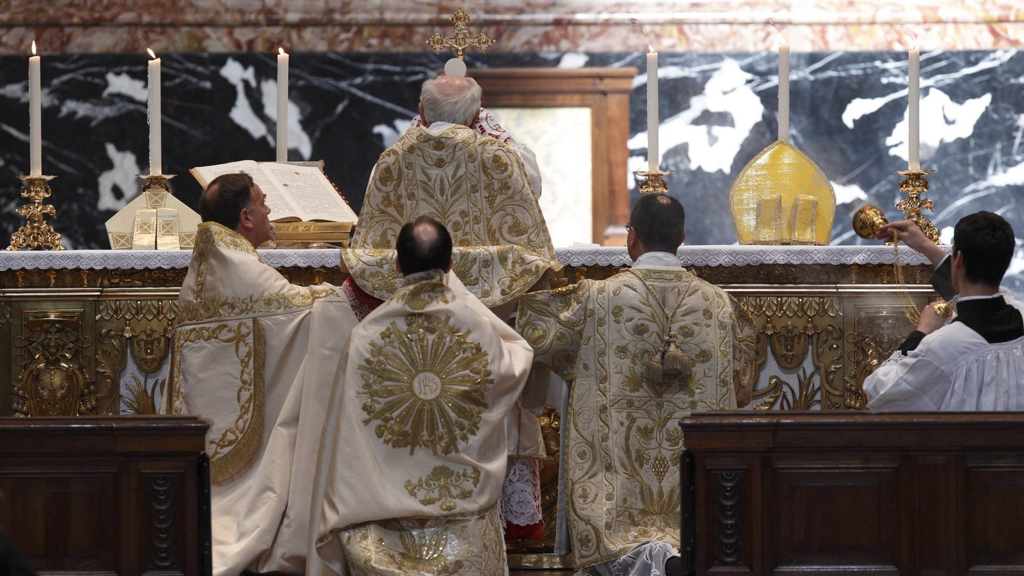 Cardinal Walter Brandmuller elevates the Eucharist during a Mass according to the Tridentine rite at the Altar of the Chair in St. Peter's Basilica at the Vatican in this May 15, 2011, file photo. The Vatican's Congregation for Divine Worship and the Sacraments has responded to bishops' questions about Pope Francis' July document limiting use of pre-Vatican II Mass. Among the clarifications was that confirmations and ordinations are not permitted to be celebrated according to the older rites. (CNS photo/Paul Haring)